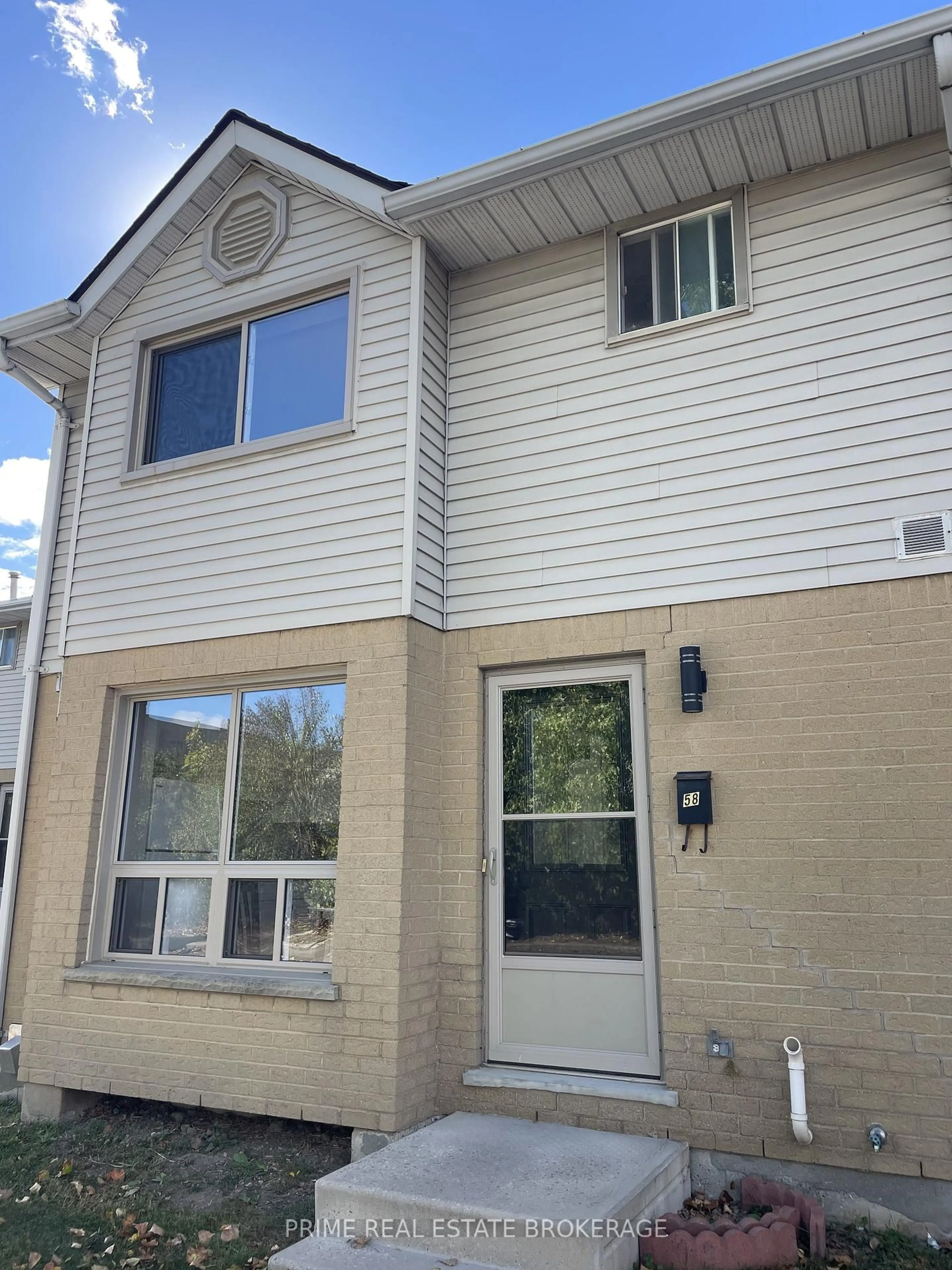 Home with vinyl exterior material, street for 35 Waterman Ave #58, London South Ontario N6C 5T8