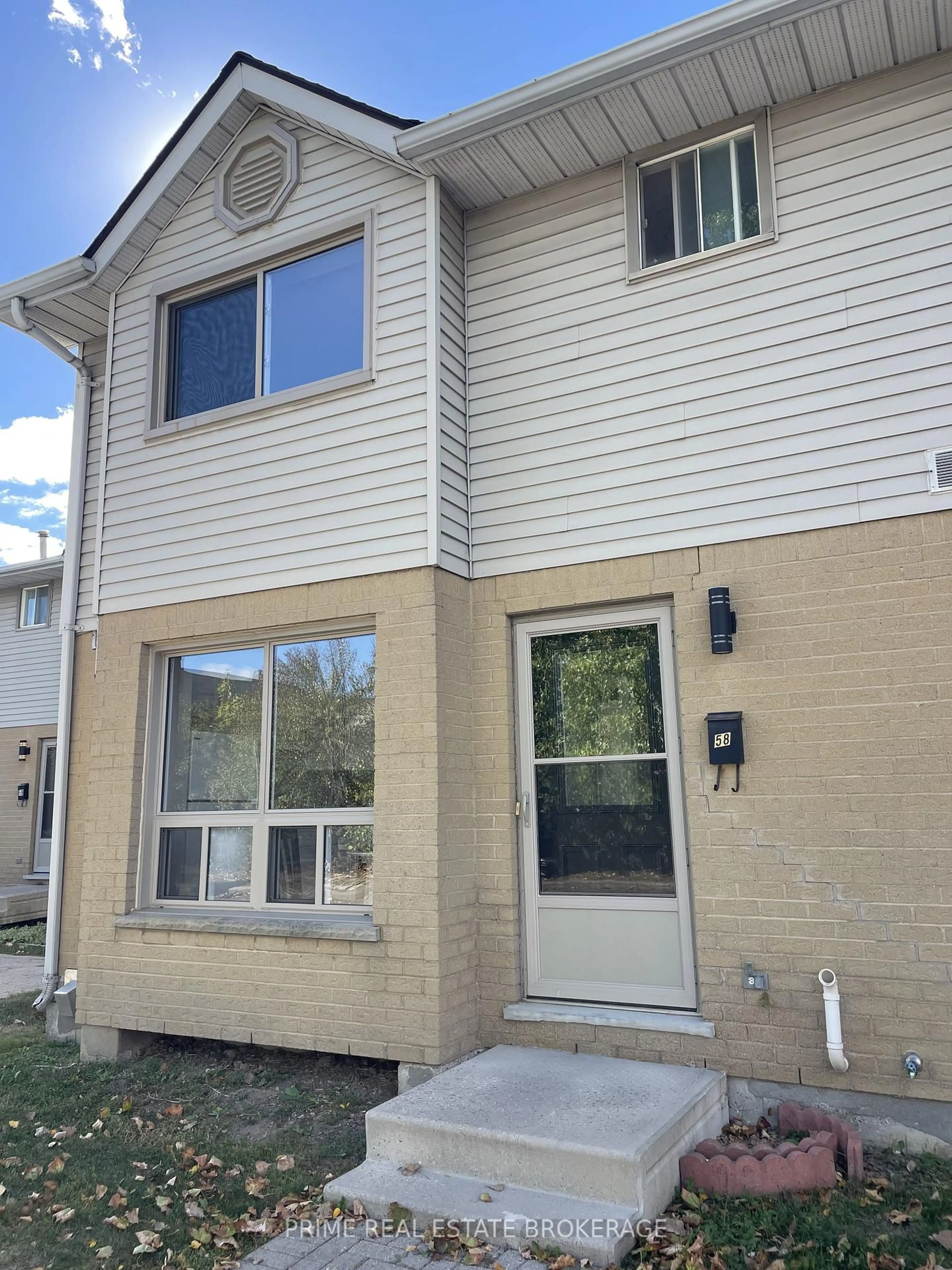 Home with vinyl exterior material, street for 35 Waterman Ave #58, London South Ontario N6C 5T8