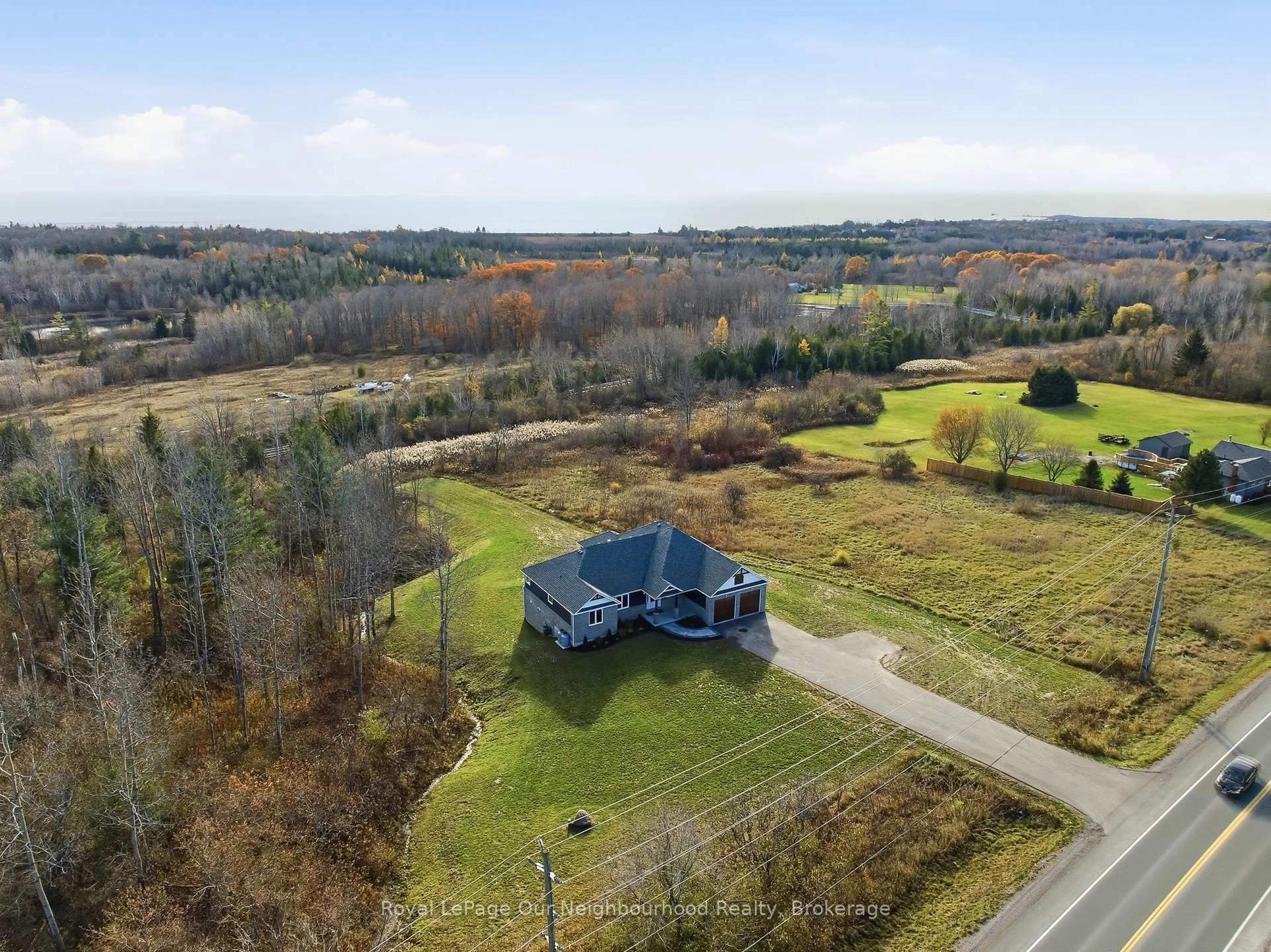 A pic from outside/outdoor area/front of a property/back of a property/a pic from drone, water/lake/river/ocean view for 14321 County Road 2, Cramahe Ontario K0K 1S0