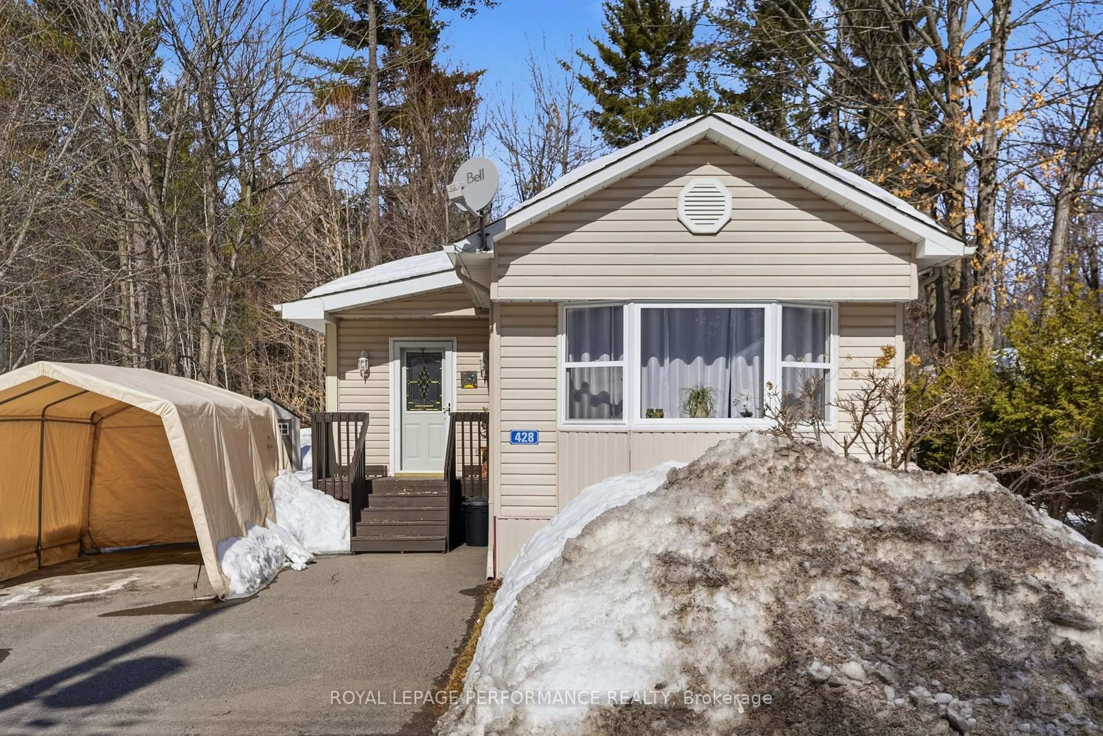 Home with vinyl exterior material, street for 8250 County Road 17 #428, Clarence-Rockland Ontario K4K 1K7