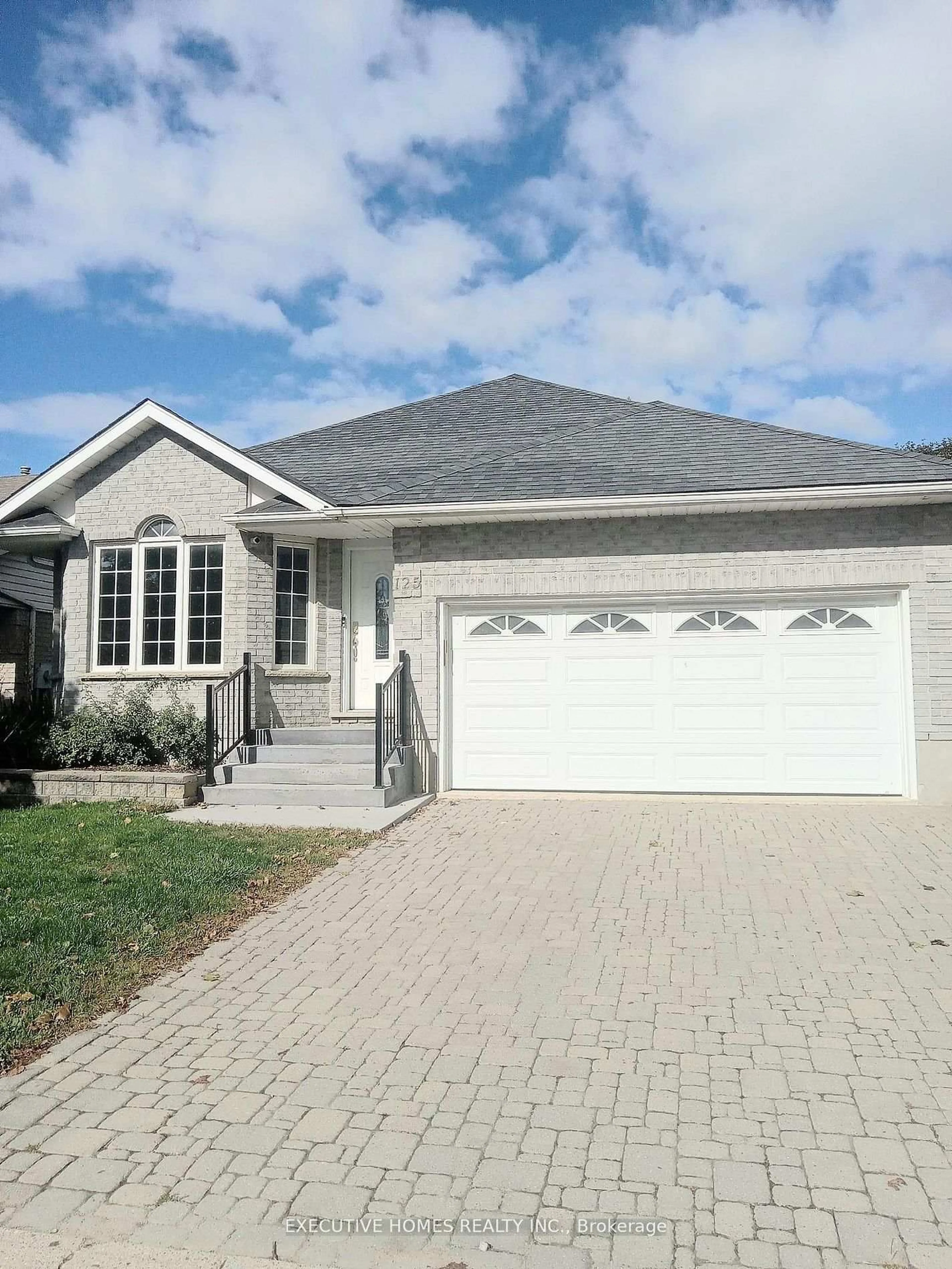 Home with vinyl exterior material, street for 125 Municipal St, Guelph Ontario N1G 4R1