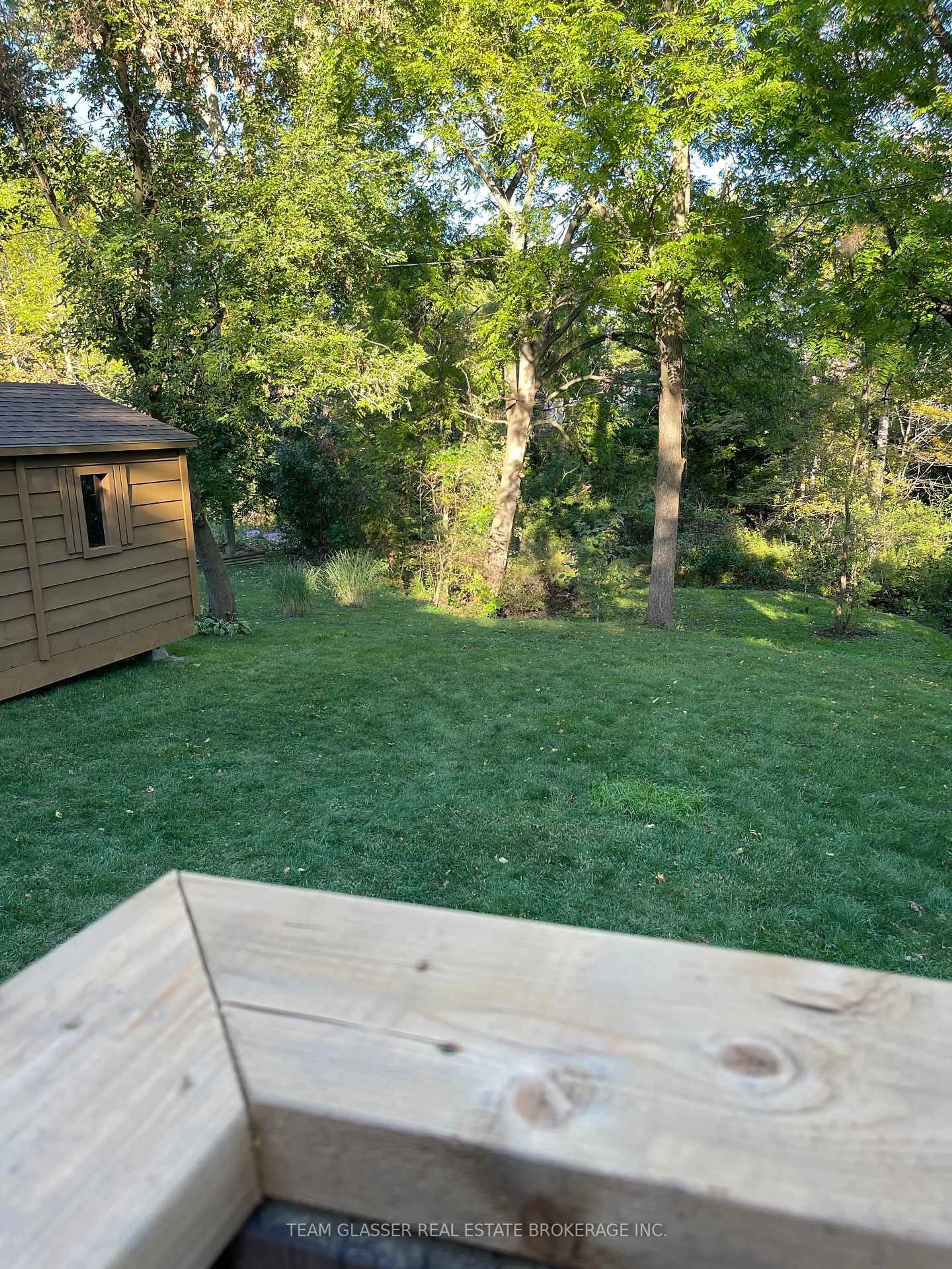 A pic from outside/outdoor area/front of a property/back of a property/a pic from drone, forest/trees view for 214 North St, Thames Centre Ontario N0L 1G3