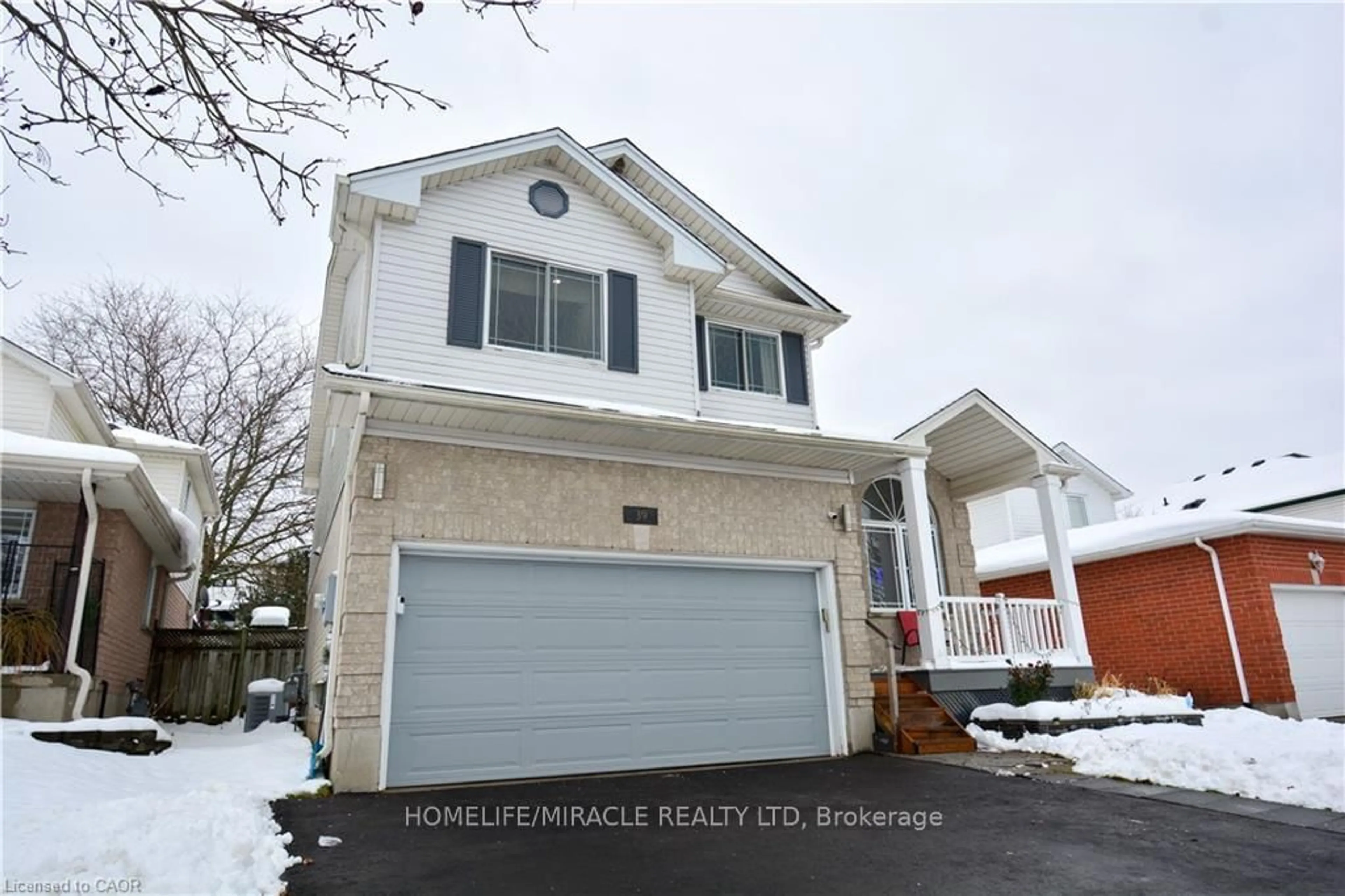 Home with vinyl exterior material, street for 39 Endeavour Dr, Cambridge Ontario N3C 4C4