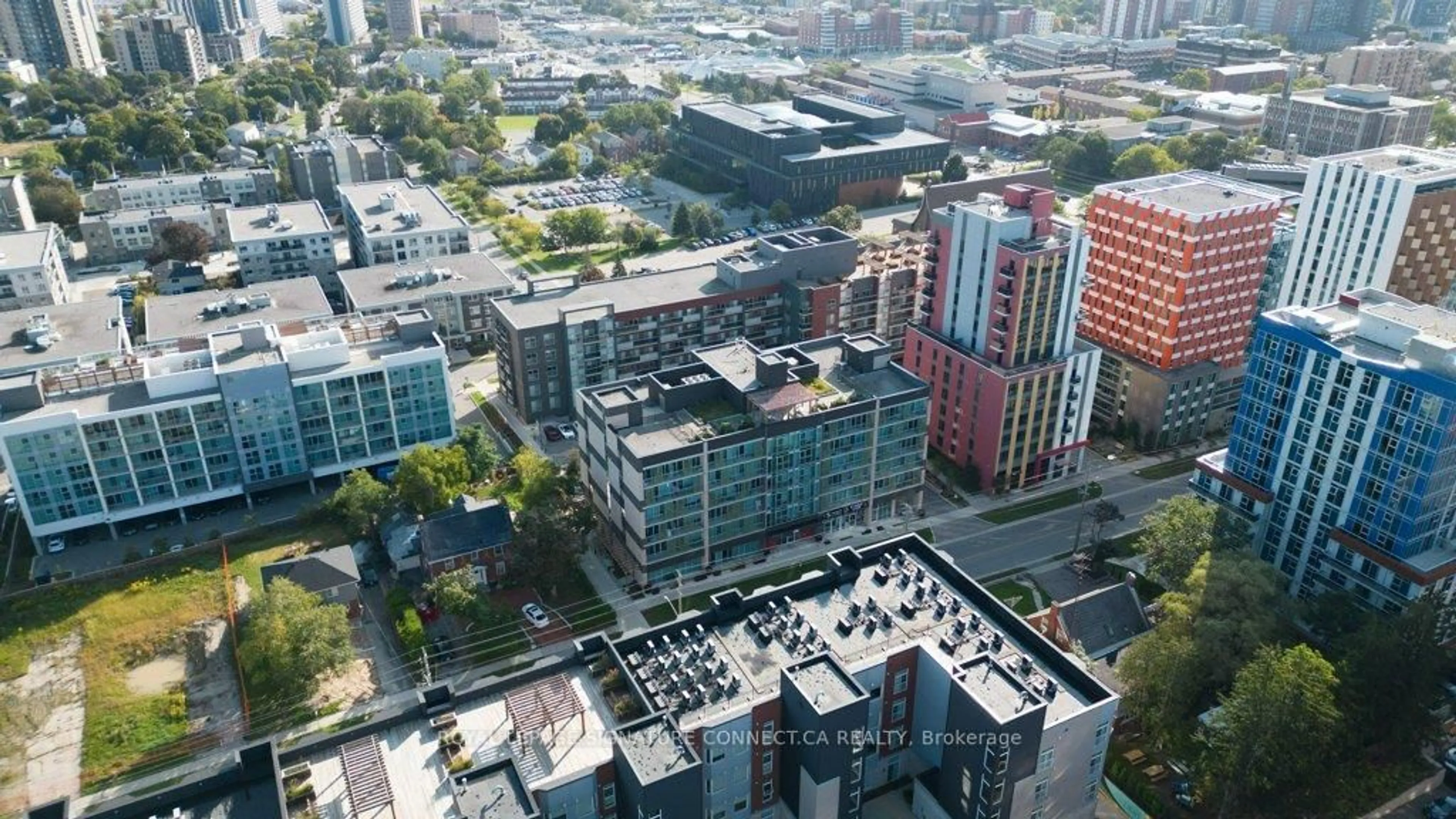 A pic from outside/outdoor area/front of a property/back of a property/a pic from drone, city buildings view from balcony for 250 Albert St #705, Waterloo Ontario N2L 0H5