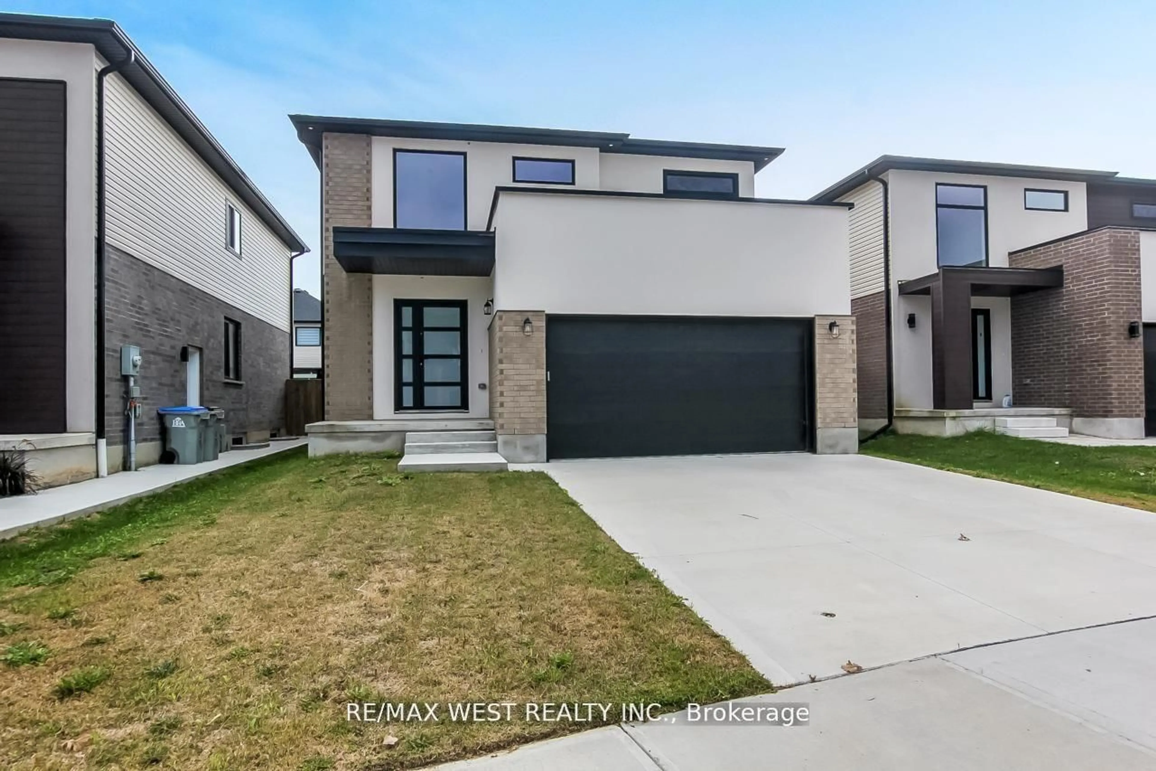 Home with brick exterior material, street for 92 Poole Cres, Middlesex Centre Ontario N0L 1R0