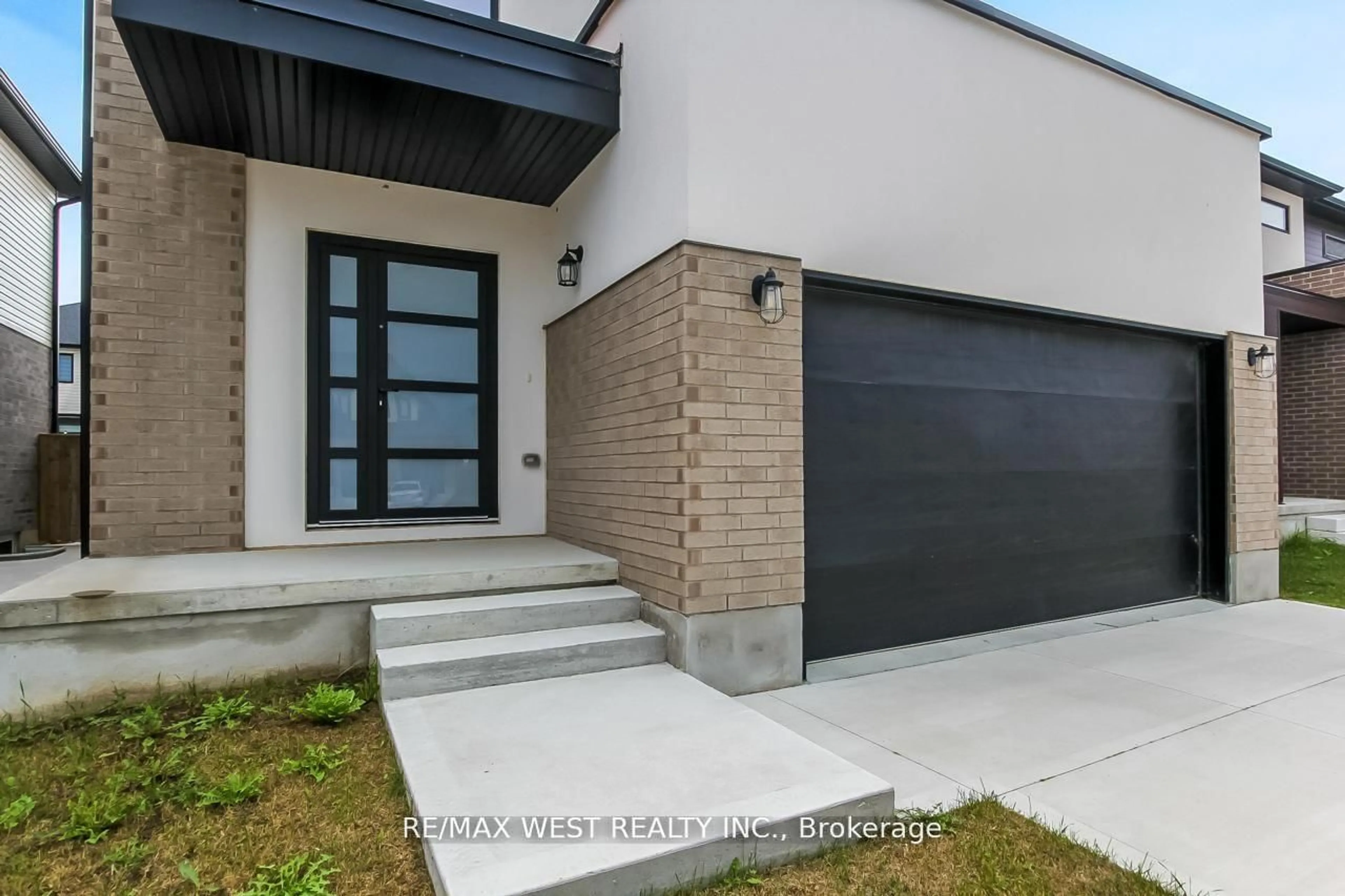 Home with brick exterior material, street for 92 Poole Cres, Middlesex Centre Ontario N0L 1R0