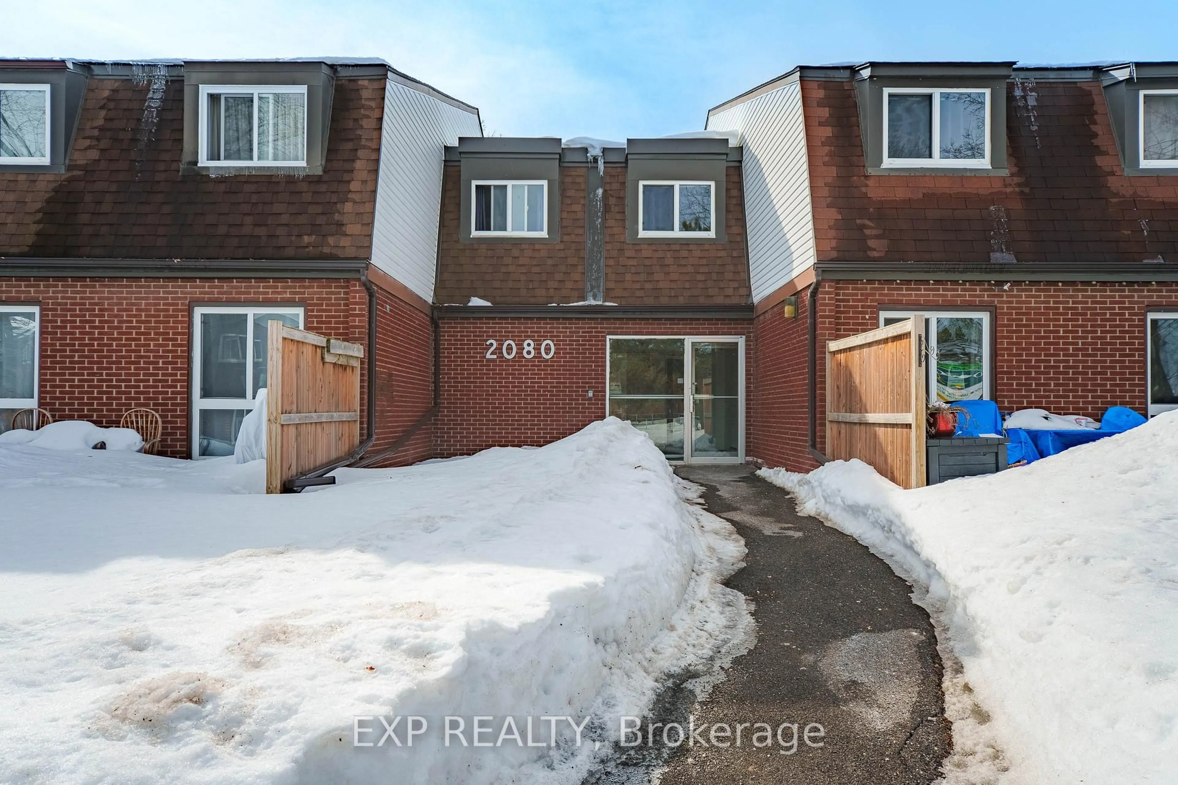 A pic from outside/outdoor area/front of a property/back of a property/a pic from drone, street for 2080 Ogilvie Rd #11K, Ottawa Ontario K1J 7N8