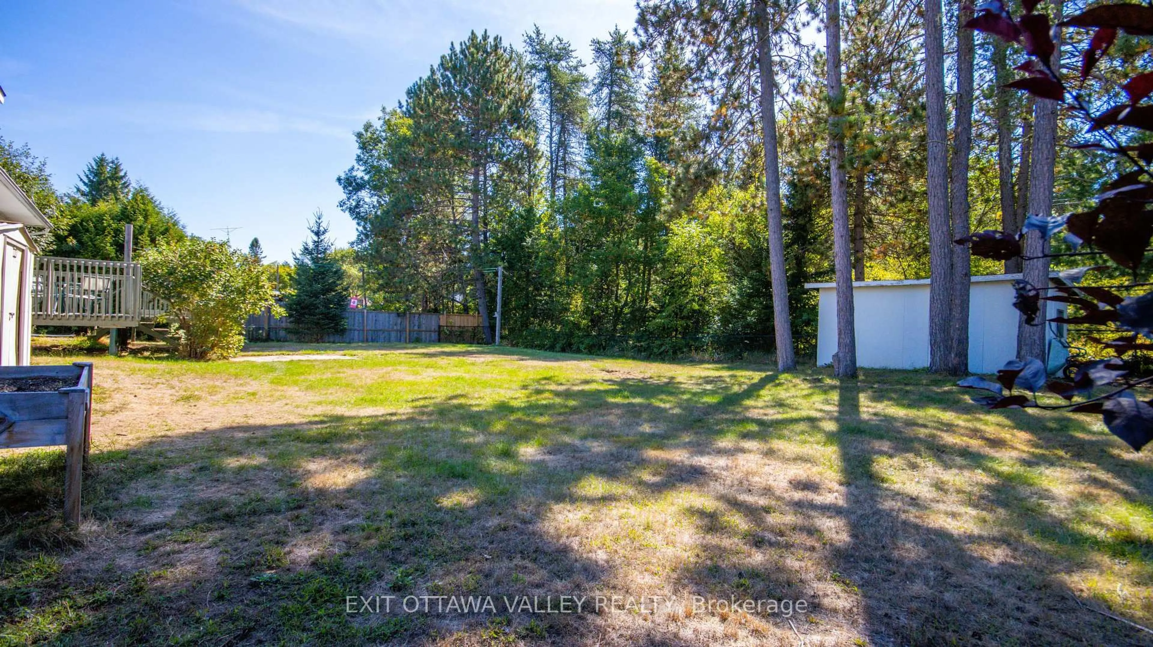 A pic from outside/outdoor area/front of a property/back of a property/a pic from drone, forest/trees view for 23 Sprucedale Ave, Barry's Bay Ontario K0J 1B0