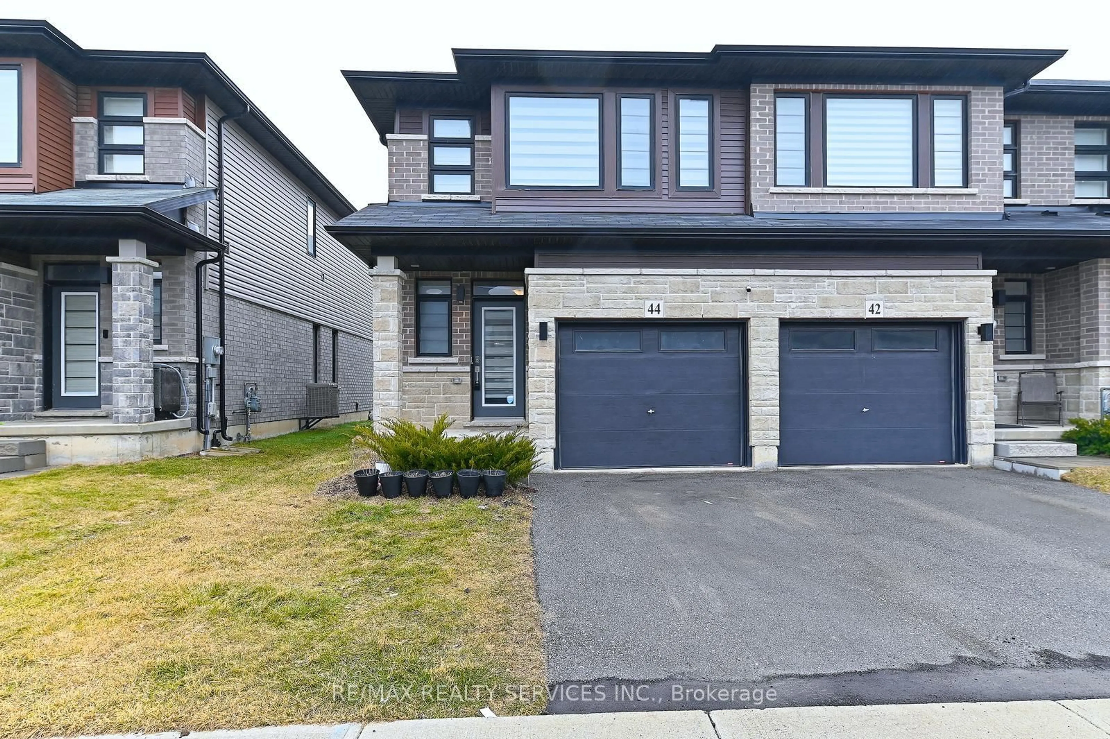 Home with brick exterior material, street for 44 June Callwood Way, Brantford Ontario N3T 0T7