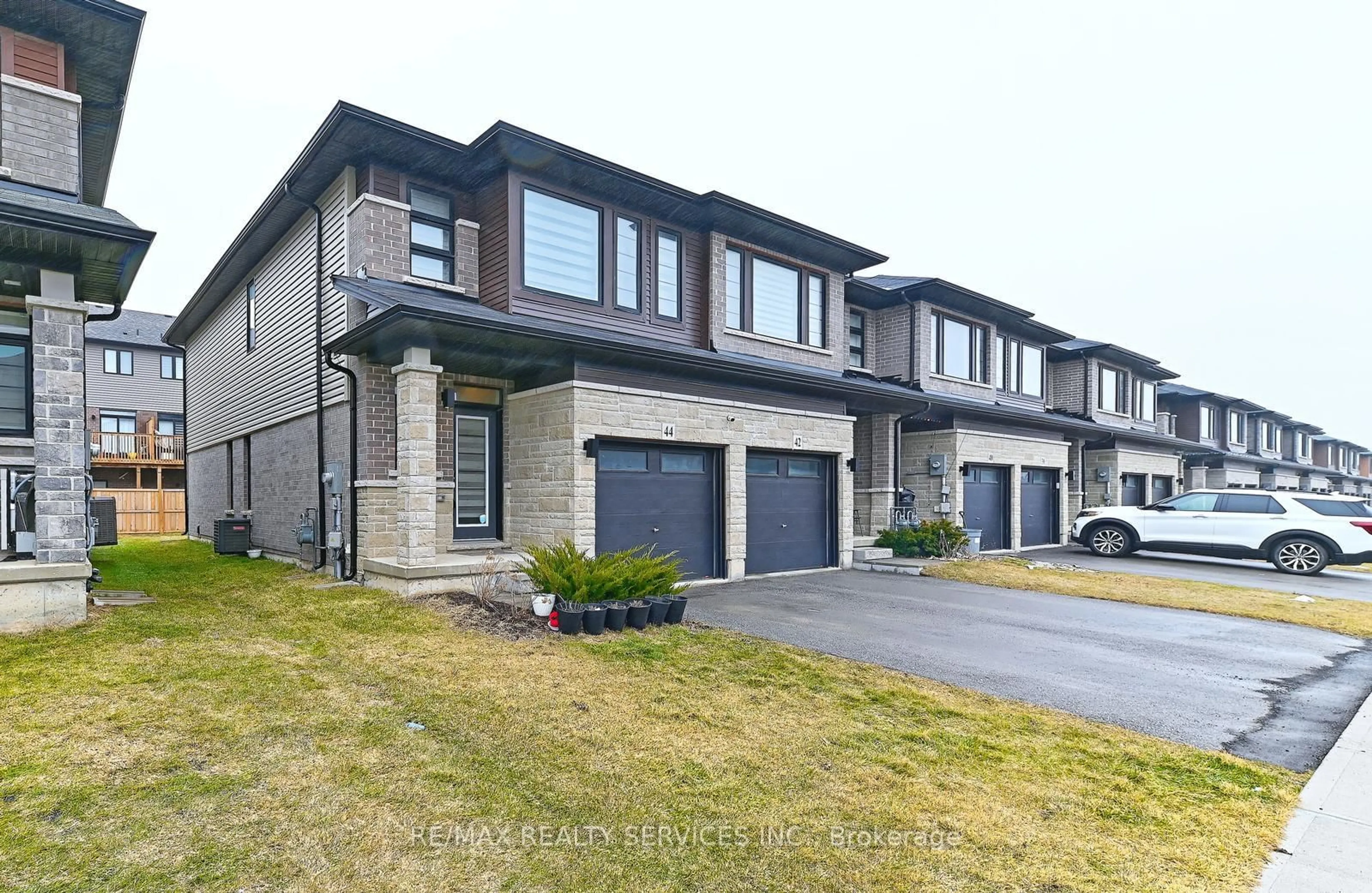 Home with brick exterior material, street for 44 June Callwood Way, Brantford Ontario N3T 0T7