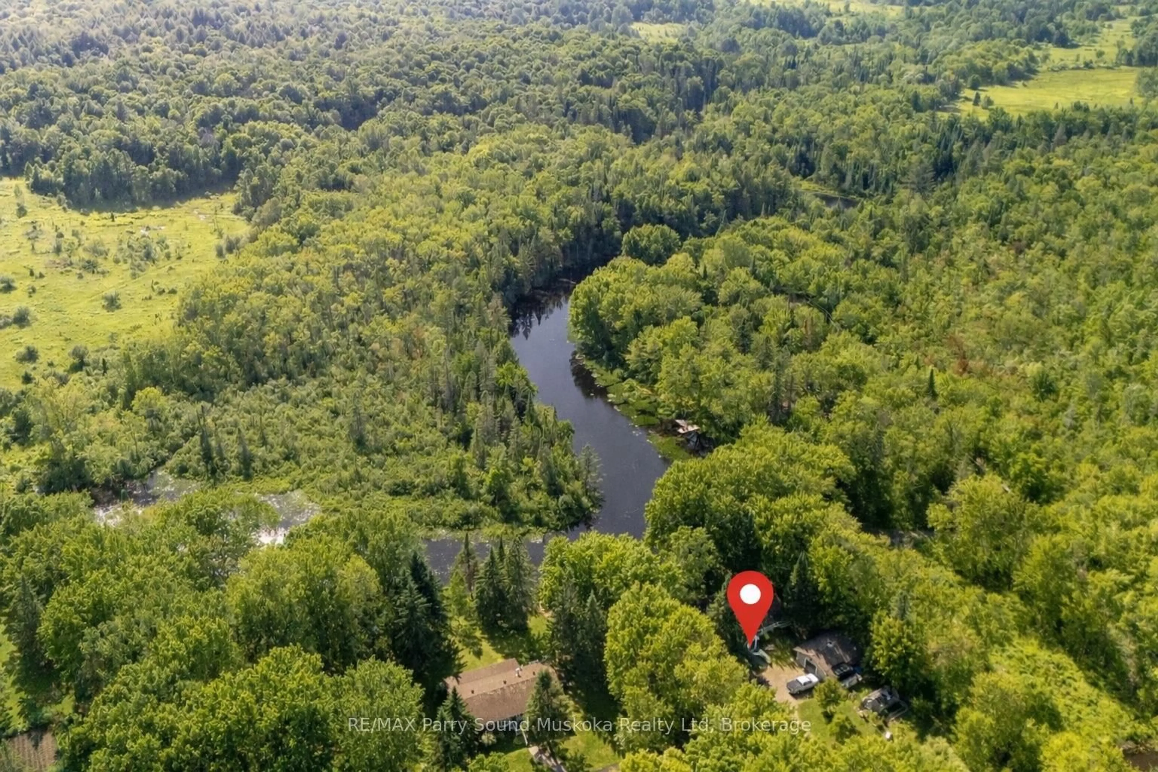 A pic from outside/outdoor area/front of a property/back of a property/a pic from drone, water/lake/river/ocean view for 49 Maple St, Seguin Ontario P0C 1J0