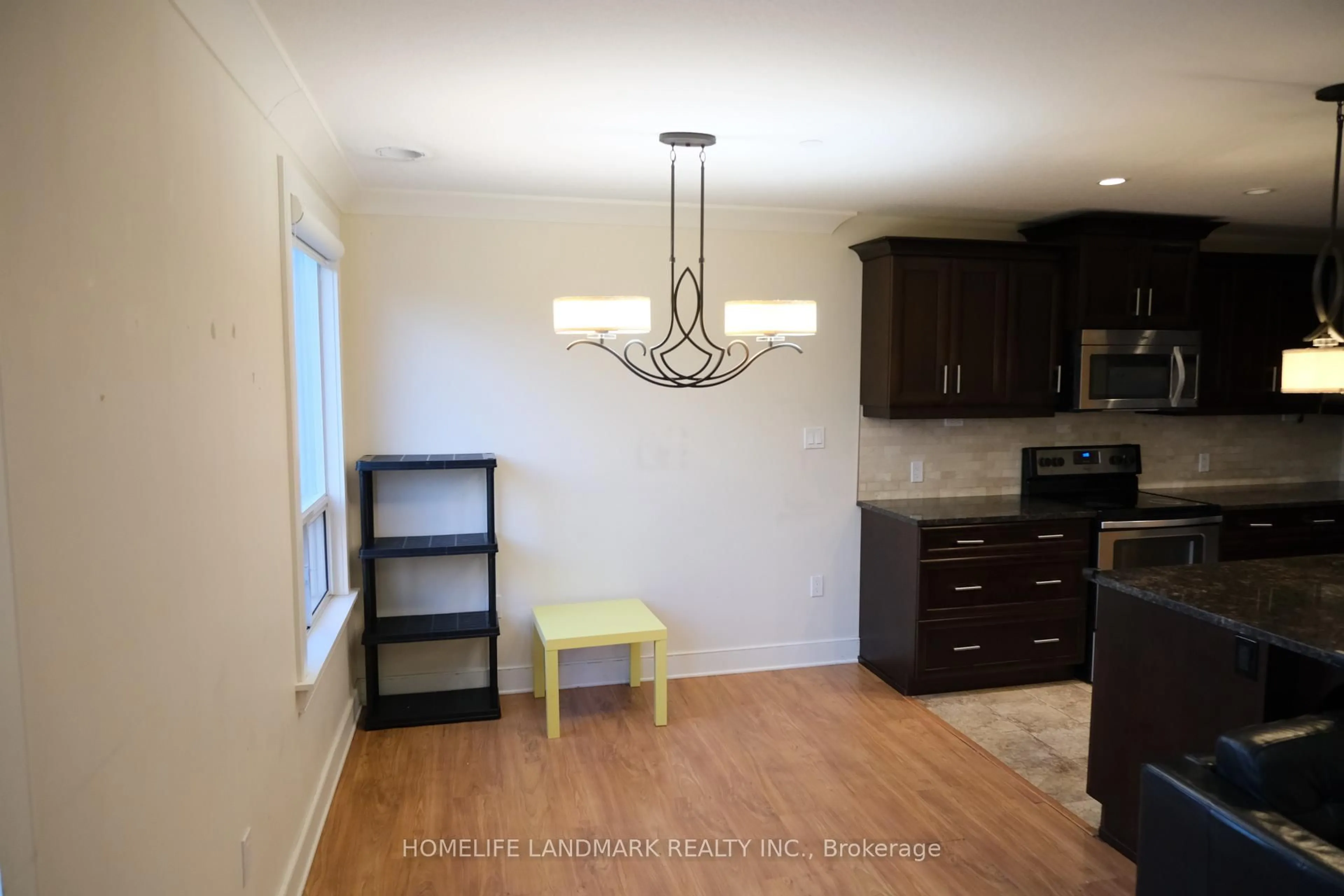 Open concept kitchen, wood/laminate floor for 320 Sugarcreek Tr #408, London North Ontario N6H 0G3