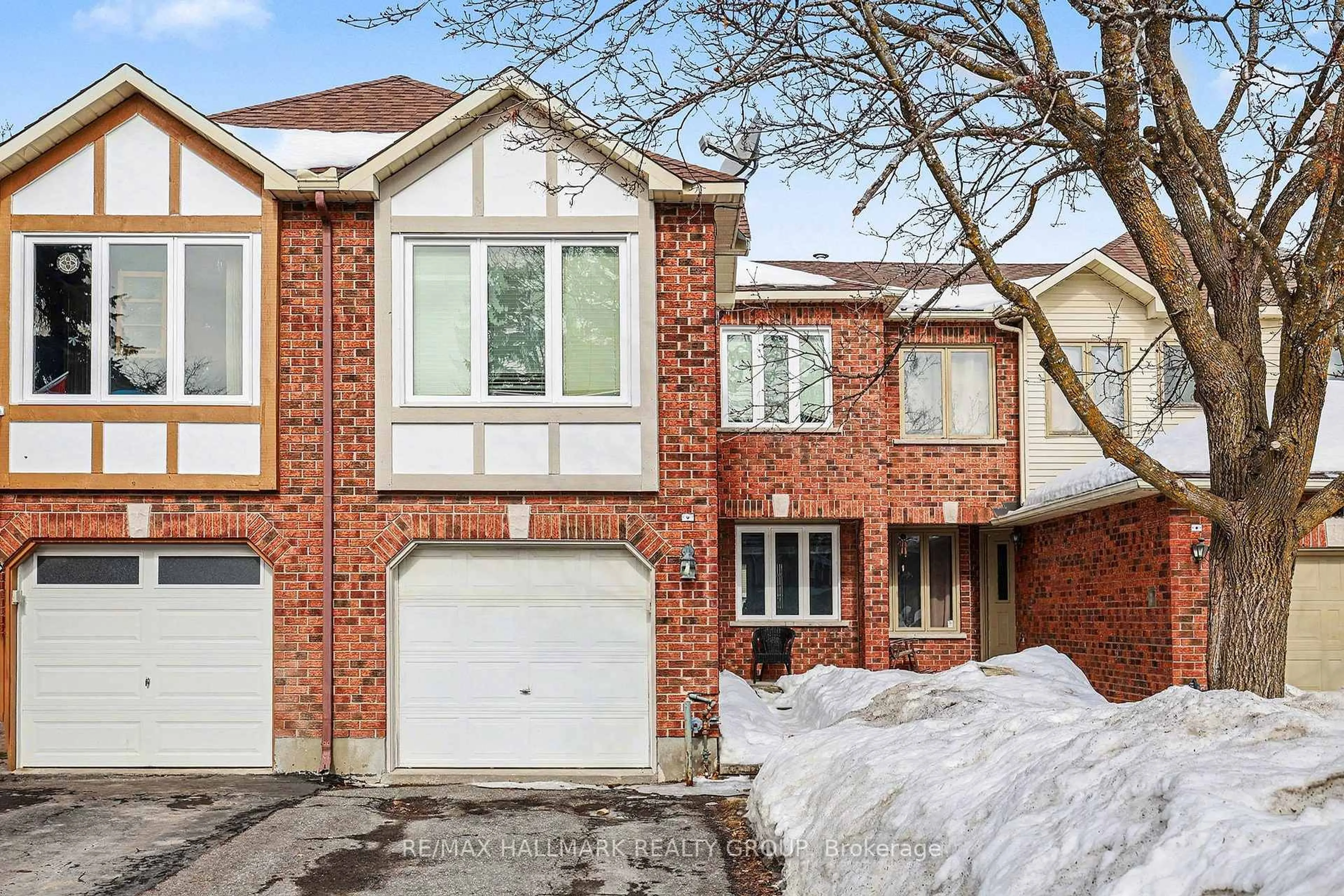 Home with brick exterior material, street for 64 Grenadier Way, Ottawa Ontario K2J 4L5