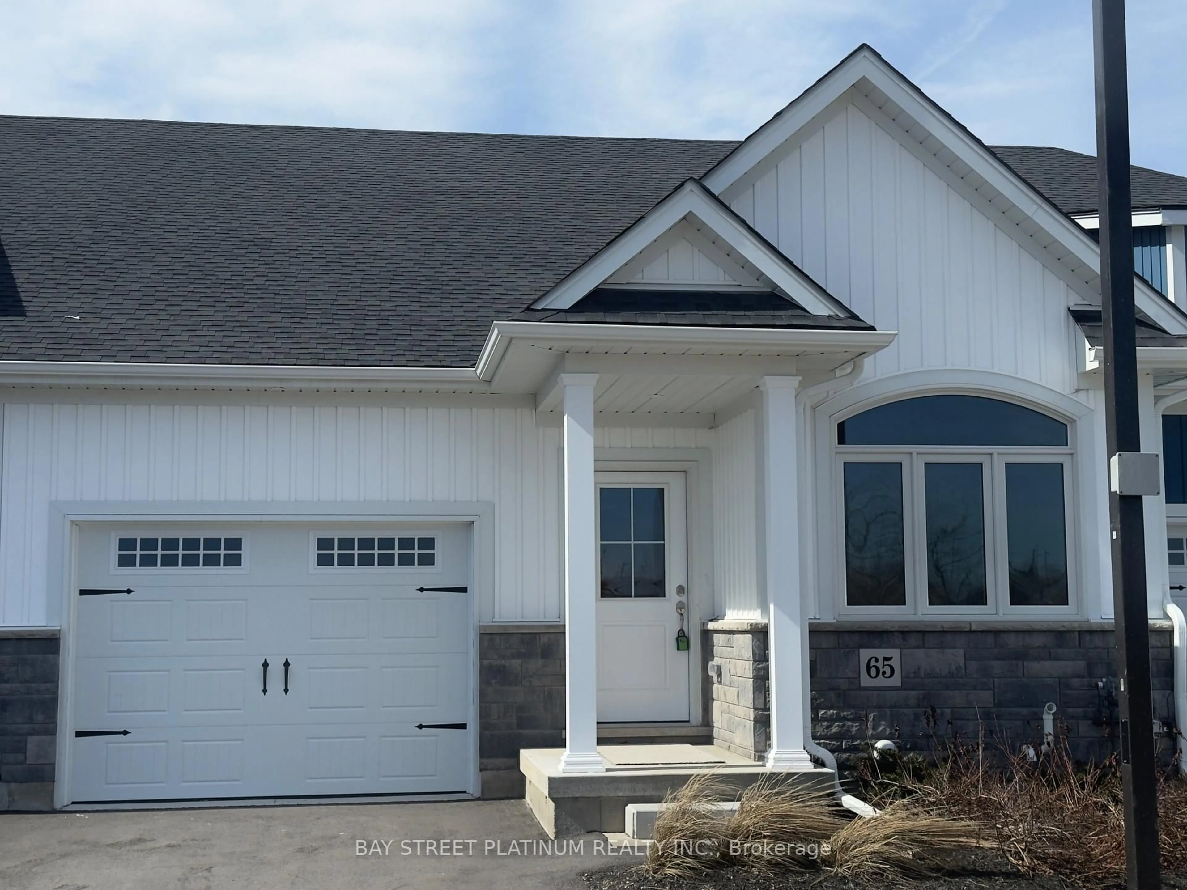 Home with vinyl exterior material, street for 65 Wiley Tr #5, Welland Ontario L3C 0K5