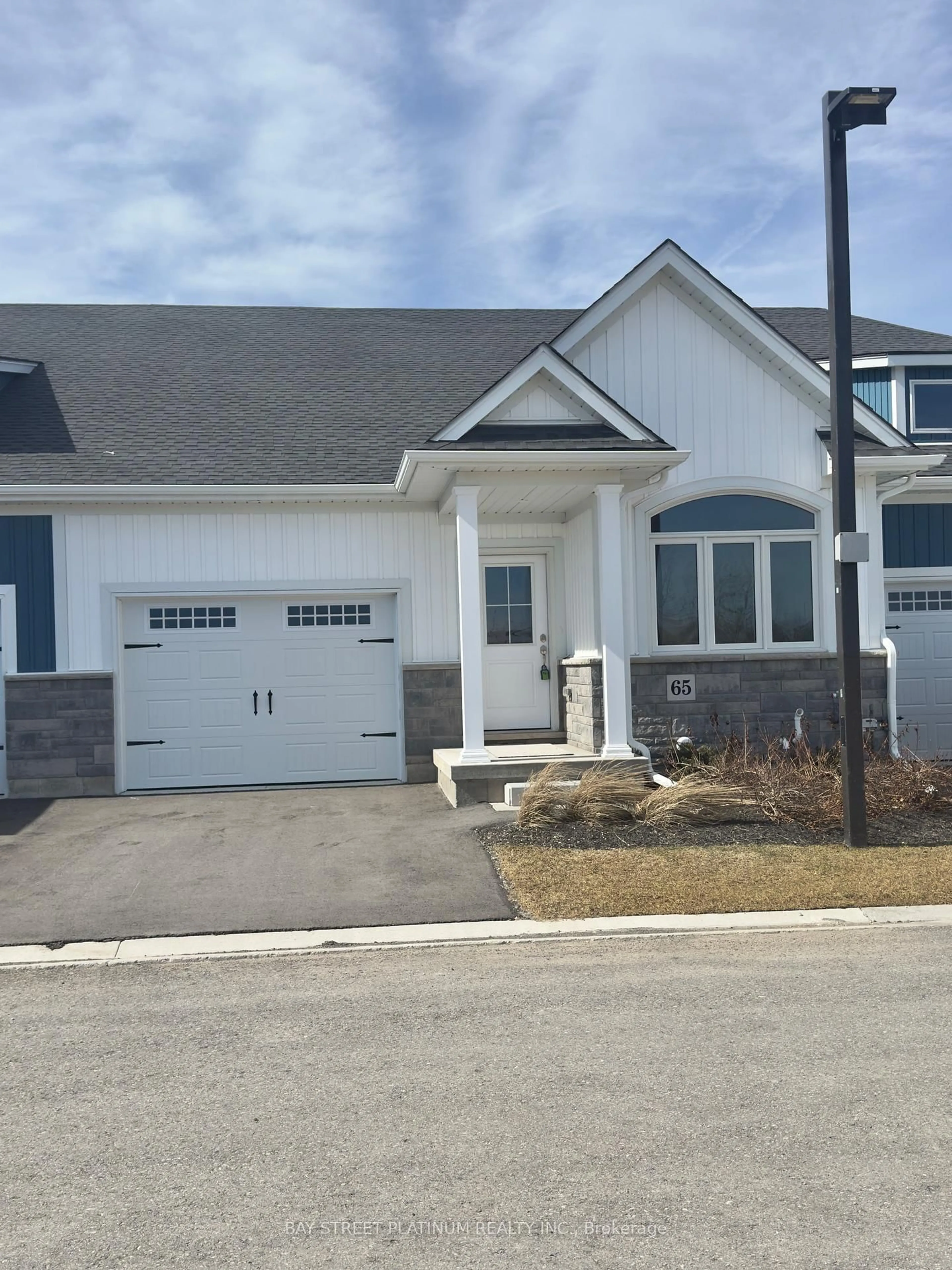 Home with vinyl exterior material, street for 65 Wiley Tr #5, Welland Ontario L3C 0K5