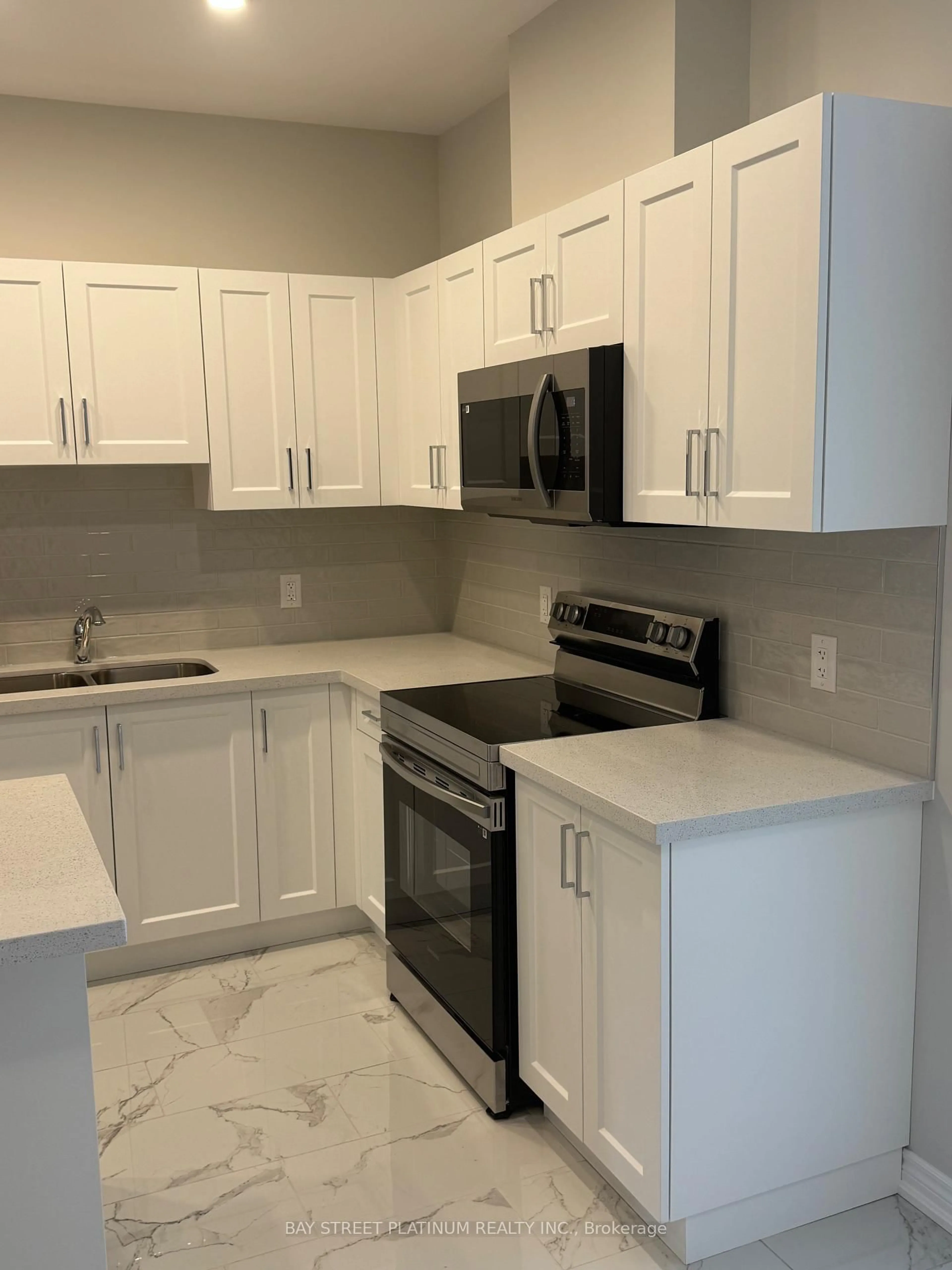 Standard kitchen, ceramic/tile floor for 65 Wiley Tr #5, Welland Ontario L3C 0K5