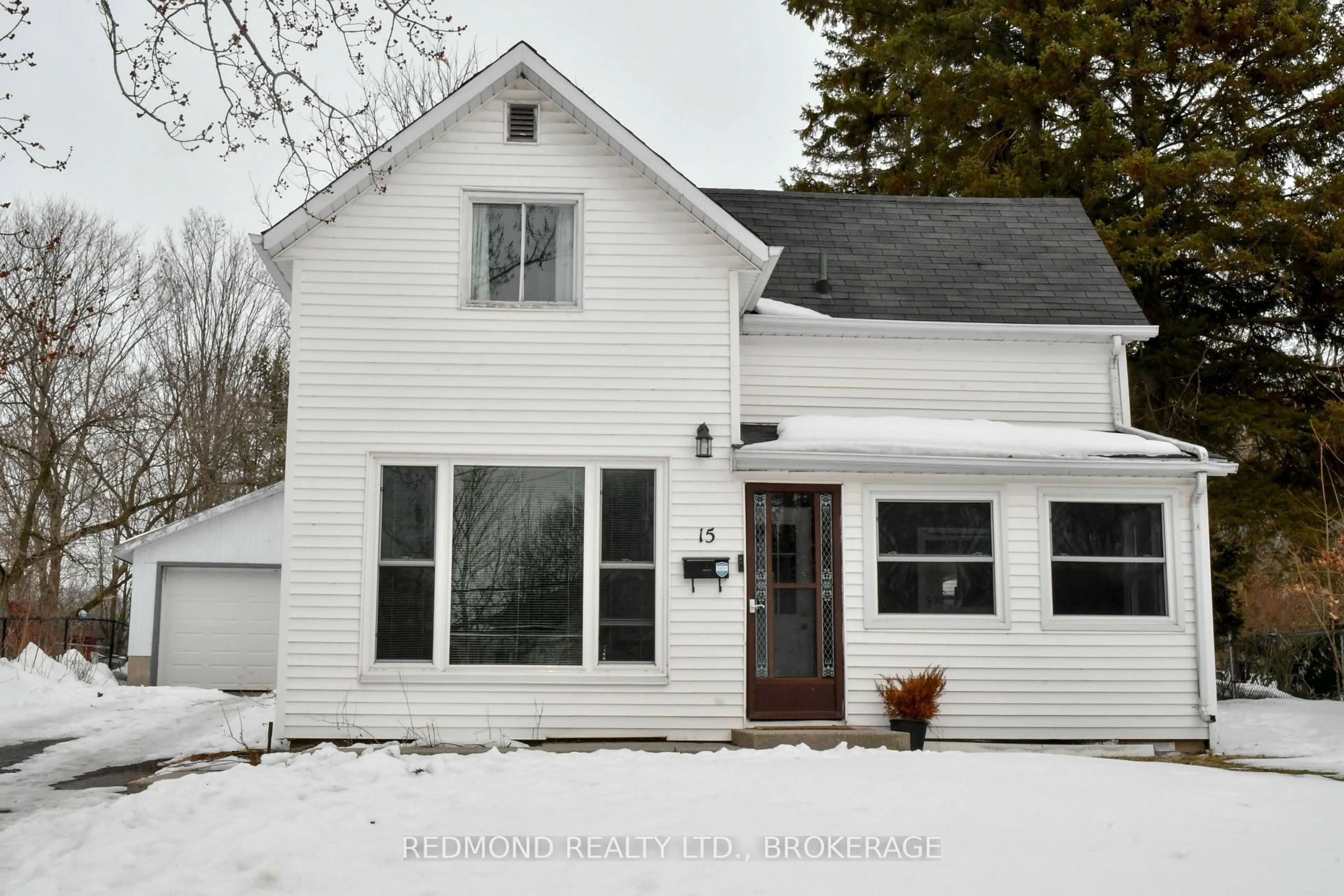 Home with vinyl exterior material, street for 15 Osborne St, Gananoque Ontario K7G 2N4