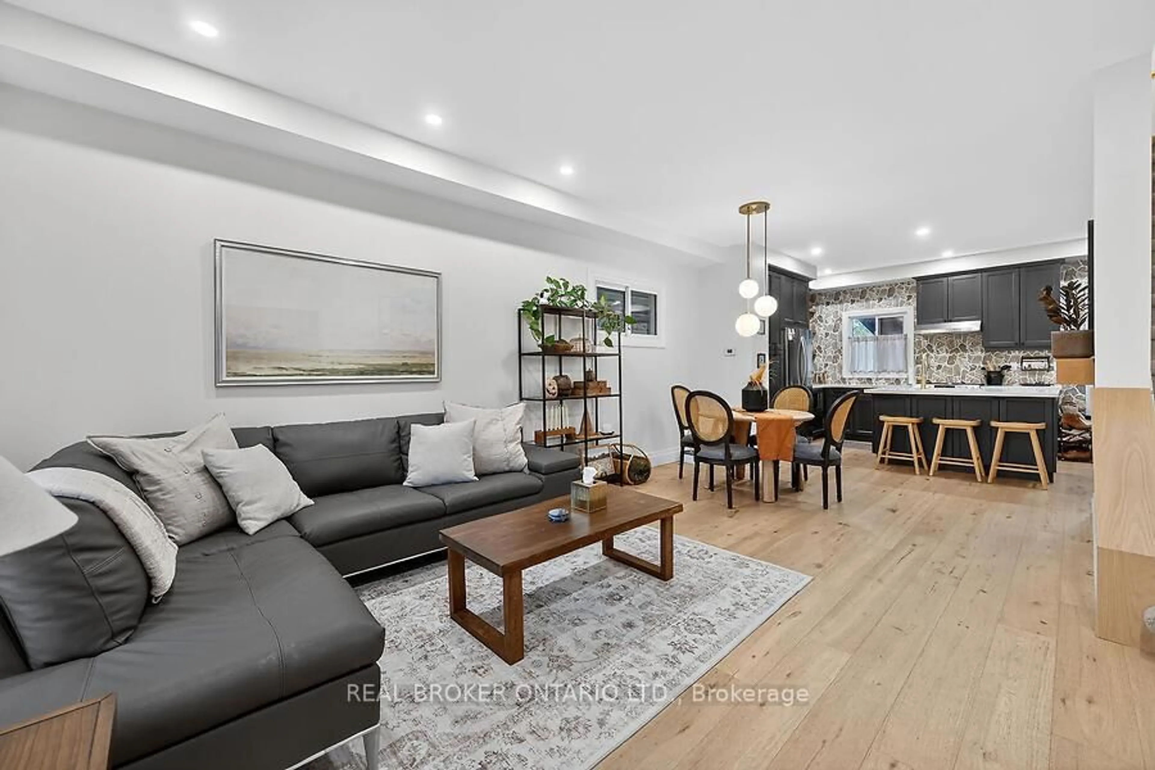 Living room with furniture, wood/laminate floor for 58 East Bend Ave, Hamilton Ontario L8L 7E3