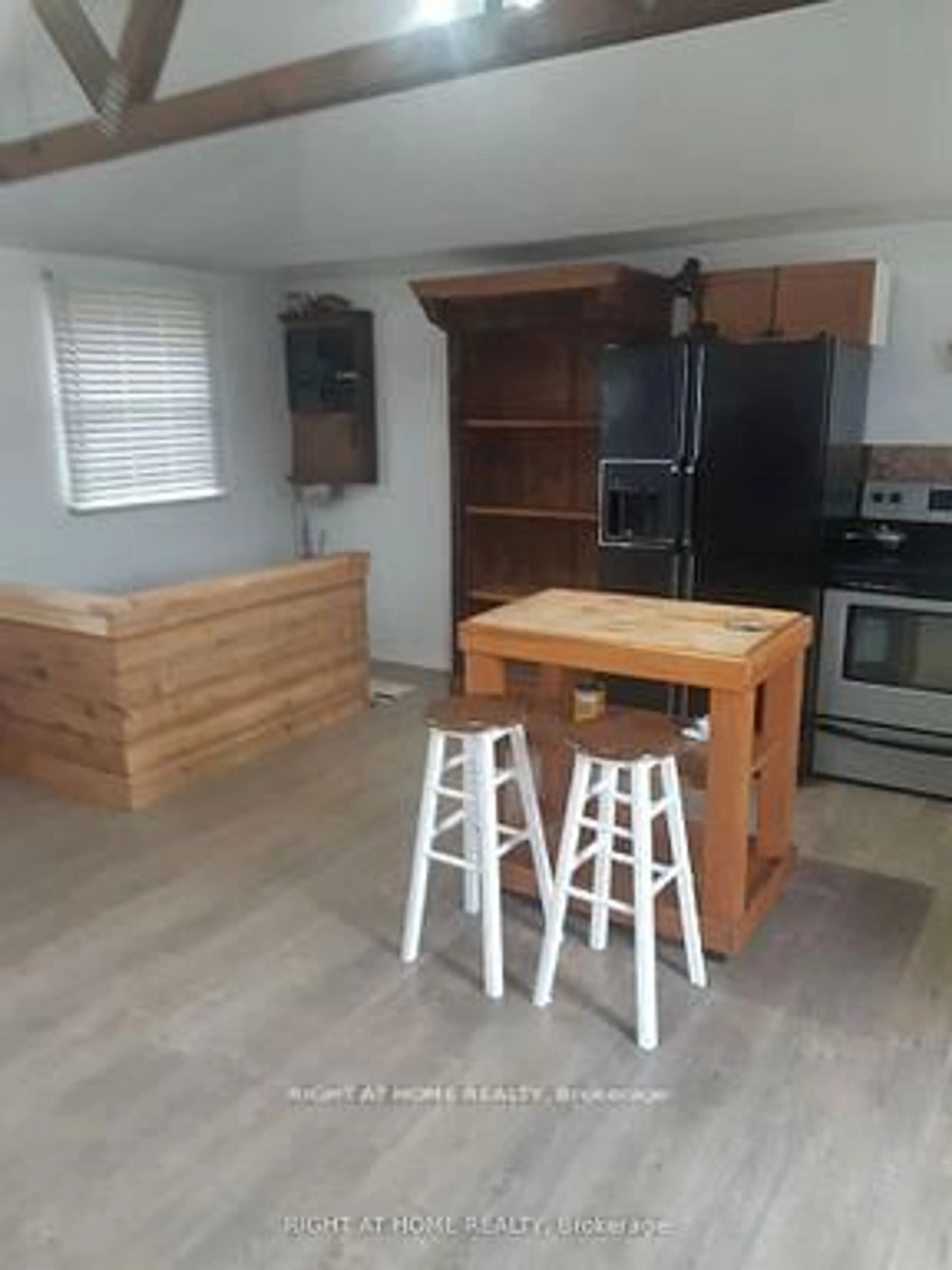 Open concept kitchen, wood/laminate floor for 208 Mcguire Beach Rd, Kawartha Lakes Ontario K0M 2B0