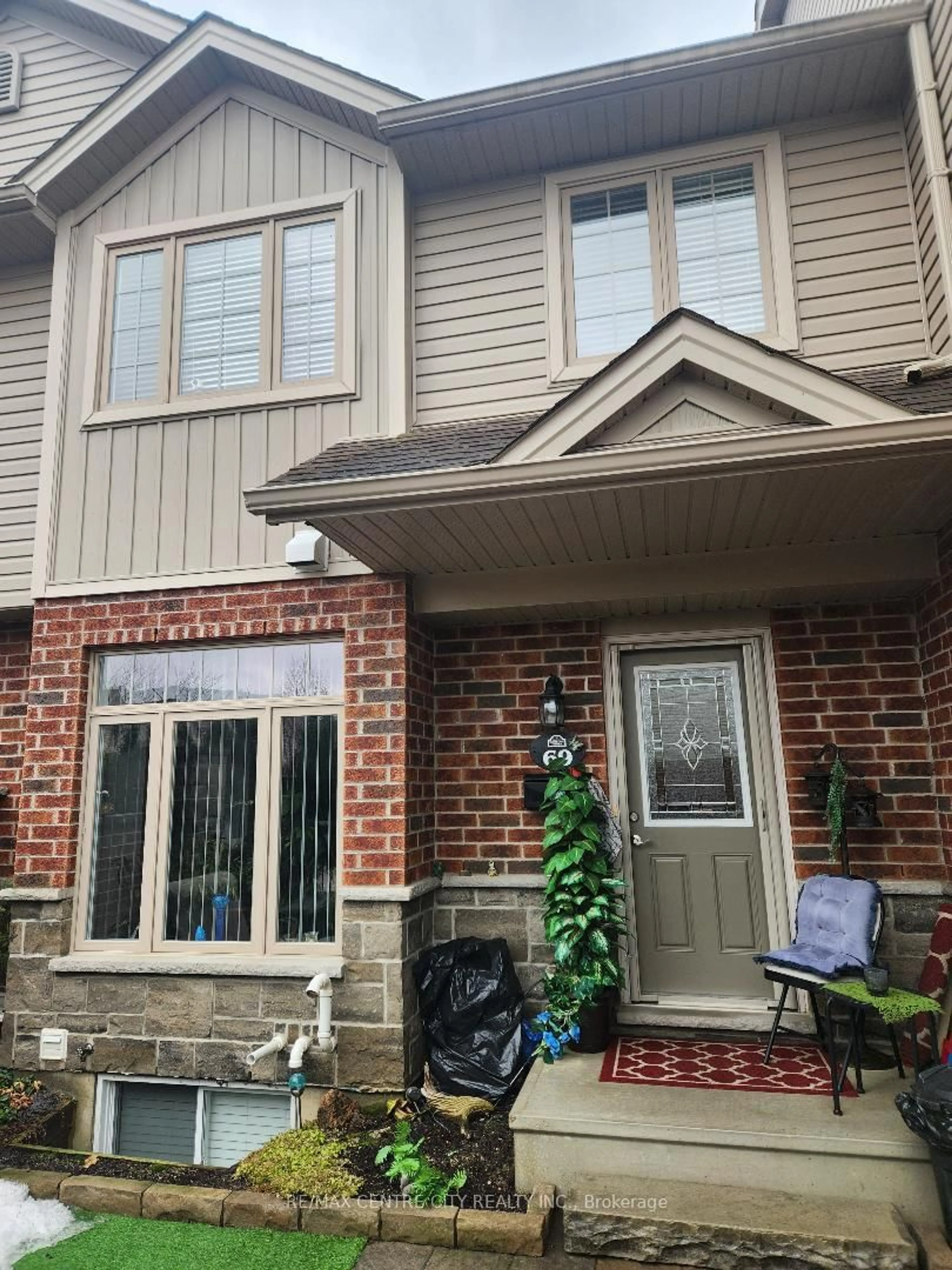 Home with brick exterior material, street for 1061 EAGLETRACE Dr #69, London North Ontario N6G 0T3