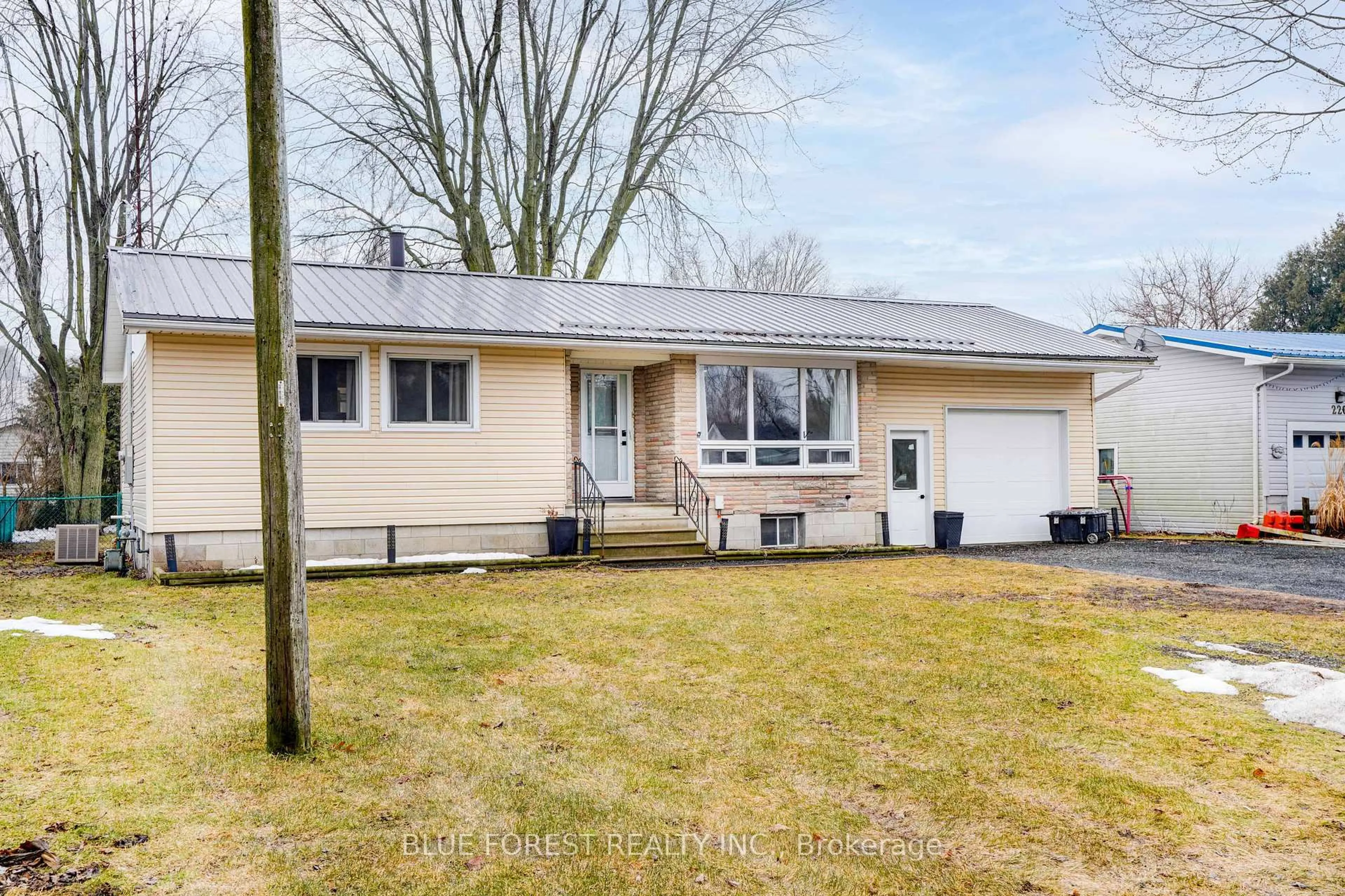 Home with vinyl exterior material, street for 218 Maple St, West Elgin Ontario N0L 2P0