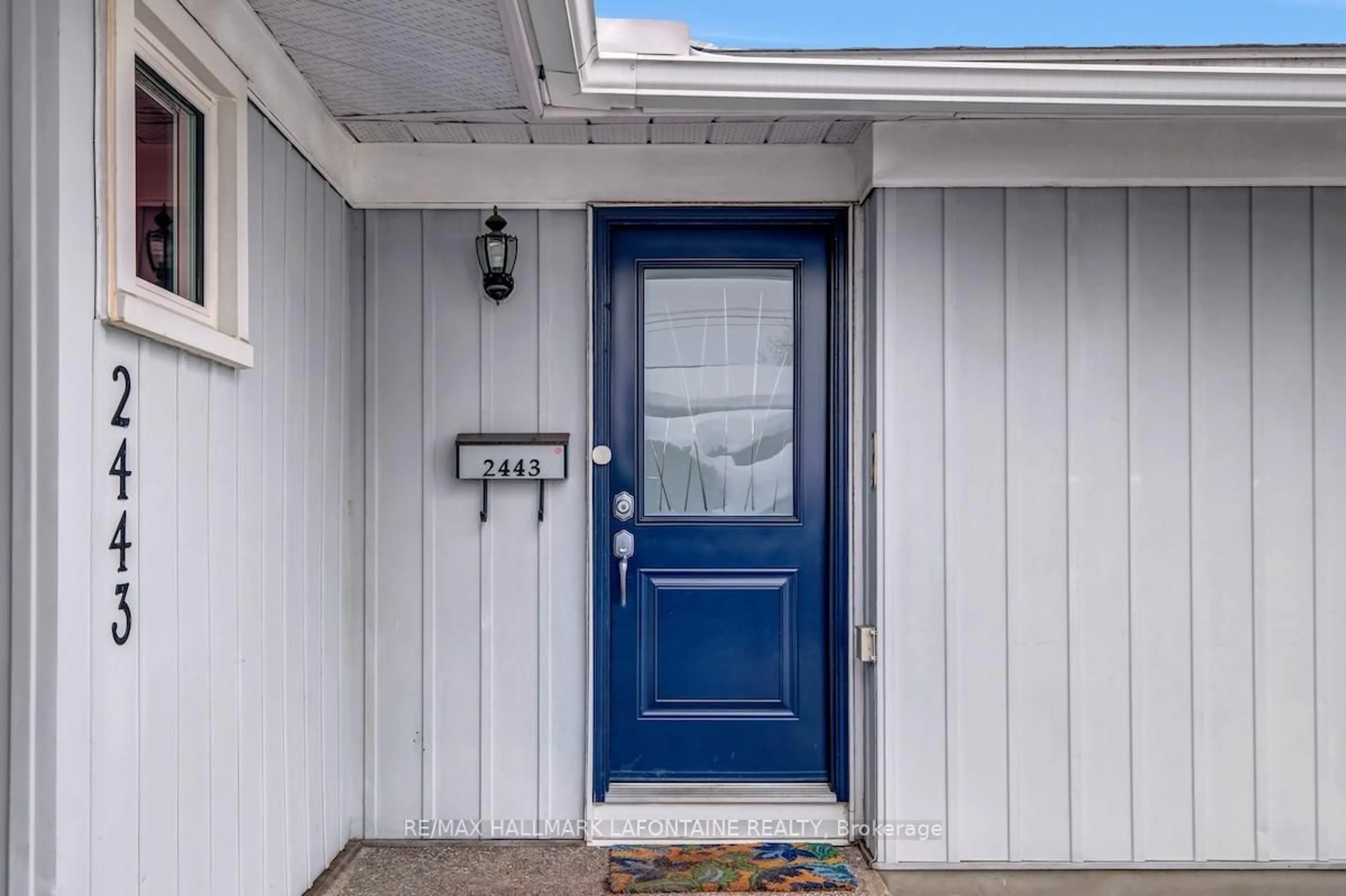 Home with vinyl exterior material, street for 2443 Ogilvie Rd, Ottawa Ontario K1J 7N3