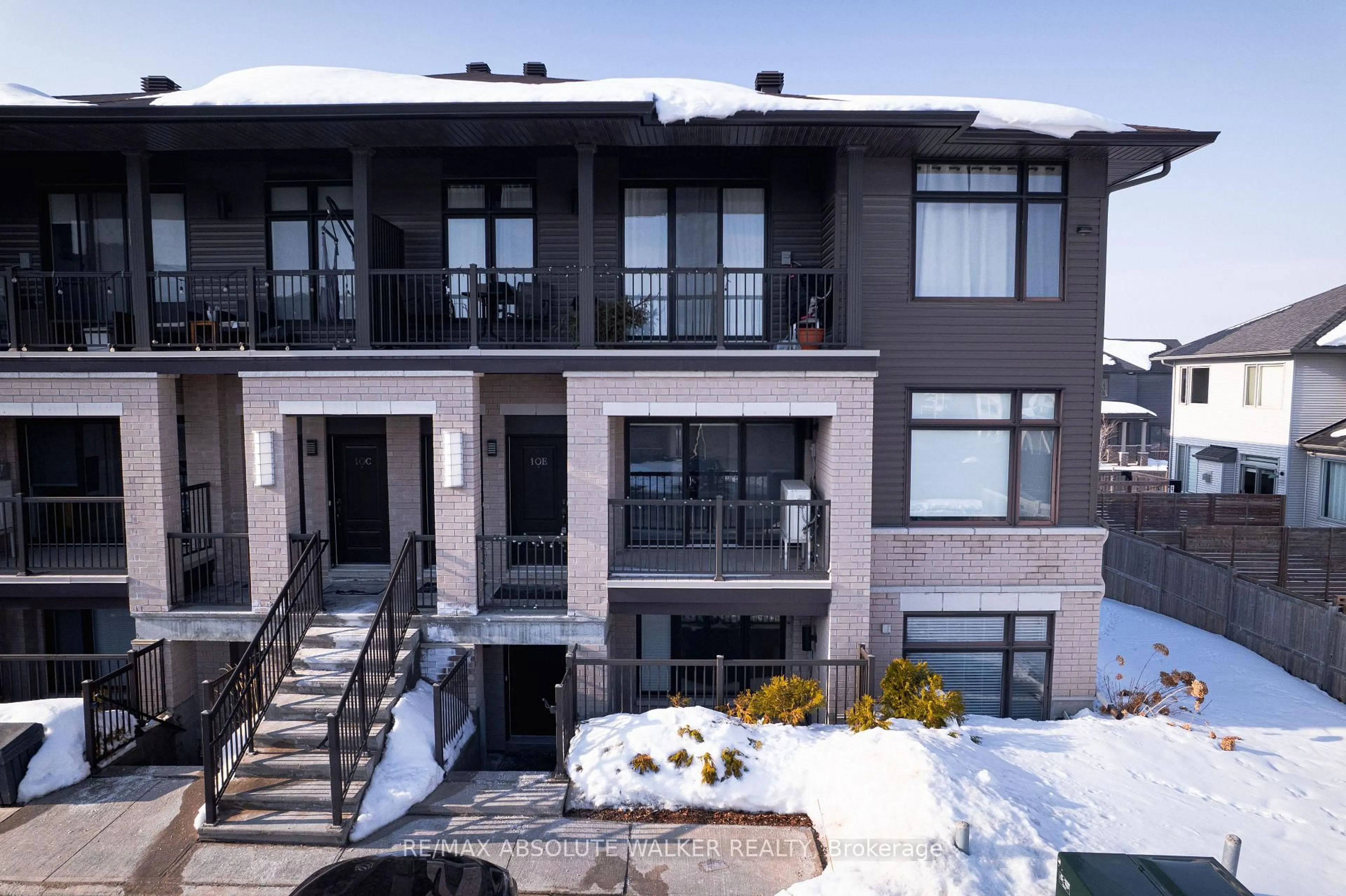 Home with brick exterior material, street for 10 Jaguar Private #E, Ottawa Ontario K2V 0J3