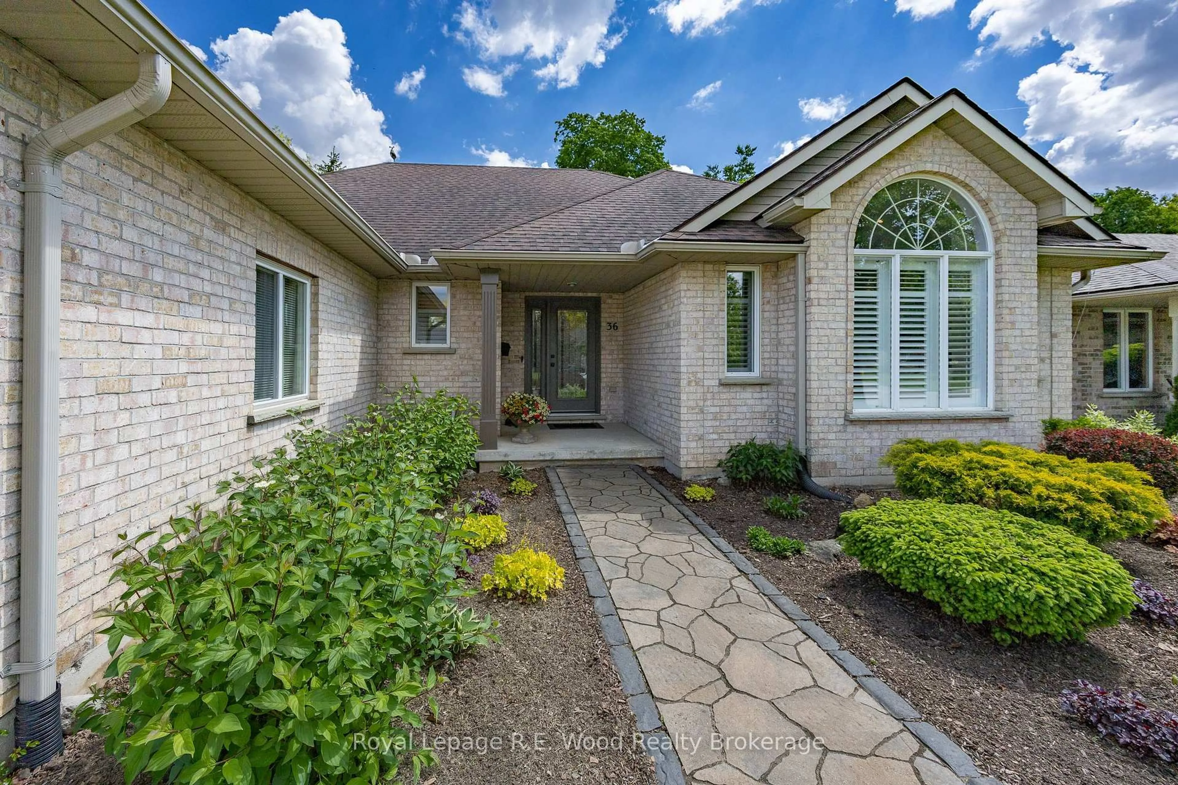 Home with brick exterior material, street for 36 Woodland Cres, Tillsonburg Ontario N4G 5R5