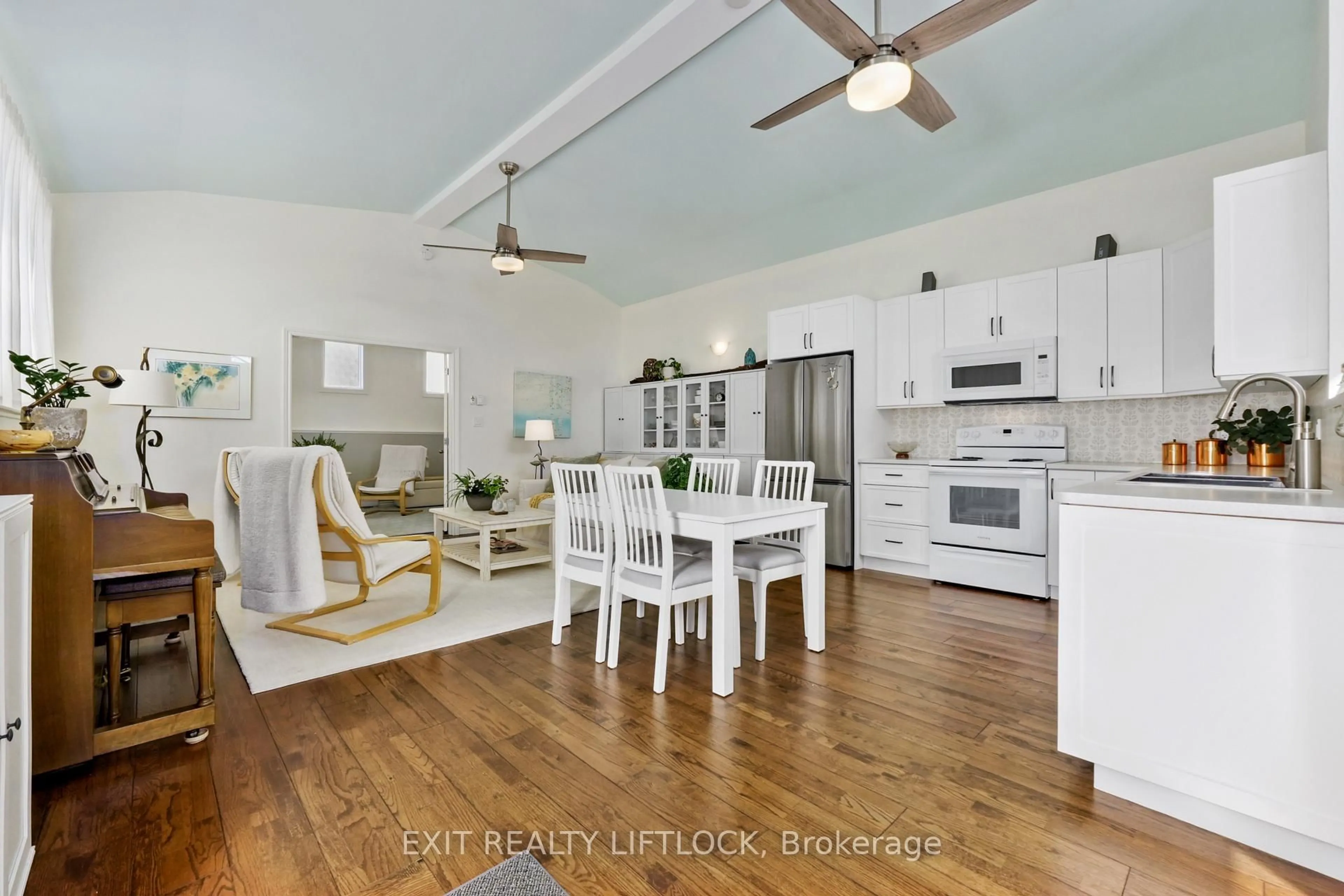 Open concept kitchen, wood/laminate floor for 834 Water St, Peterborough Ontario K9H 3N9