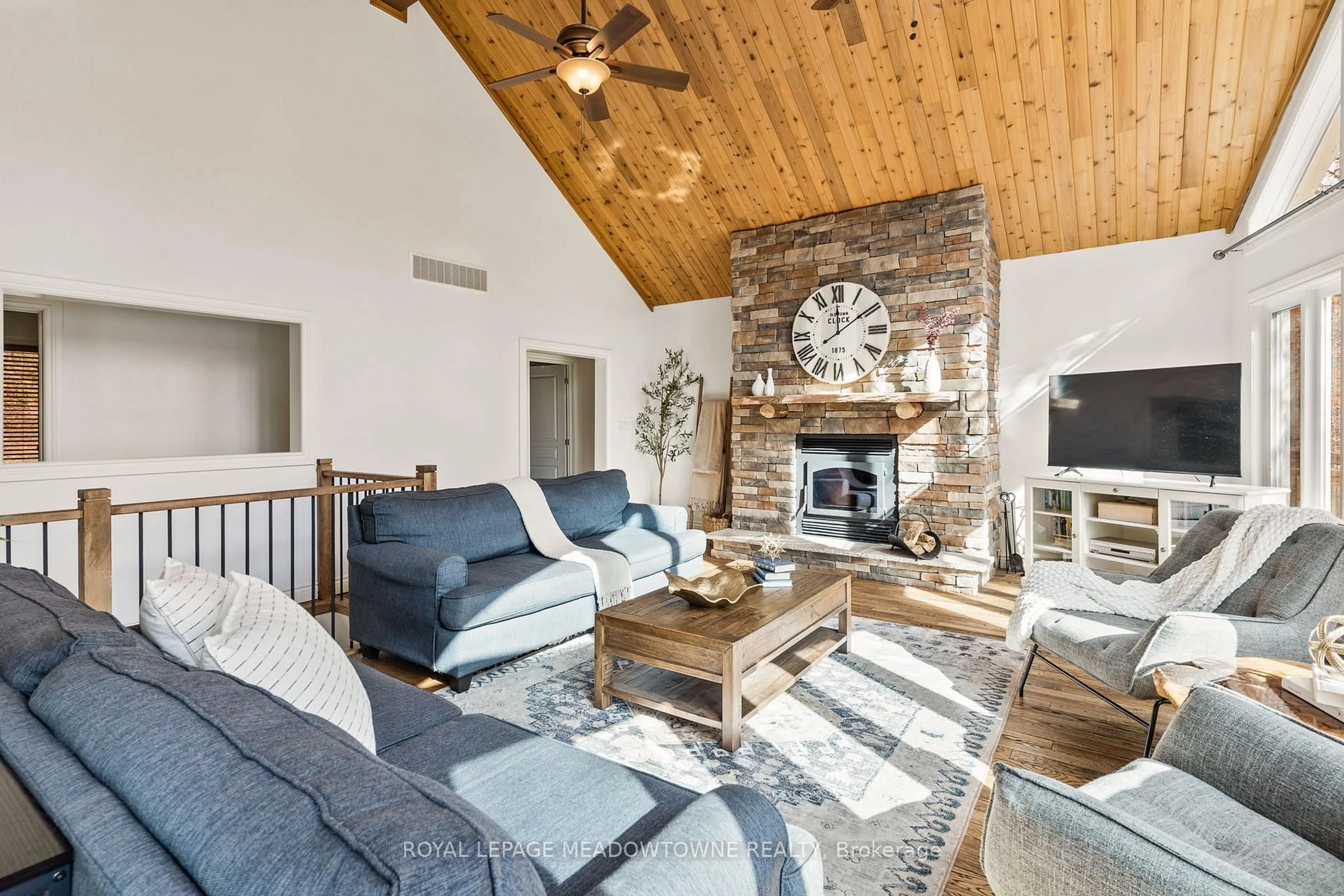 Living room with furniture, wood/laminate floor for 1658 Hospitality Rd, Minden Hills Ontario K0M 2K0