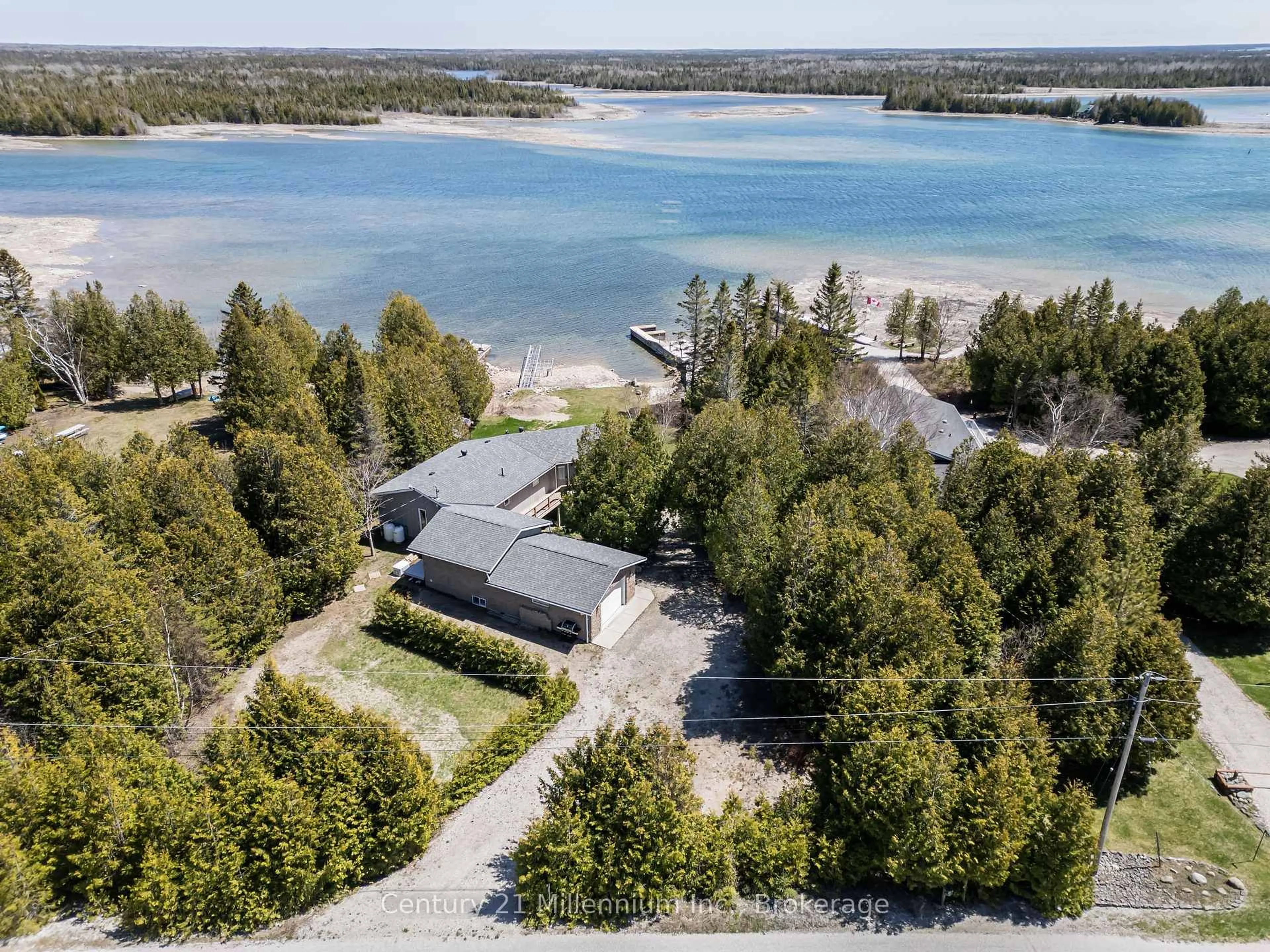 A pic from outside/outdoor area/front of a property/back of a property/a pic from drone, water/lake/river/ocean view for 119 Pine Tree Harbour Rd, Northern Bruce Peninsula Ontario N0H 1Z0