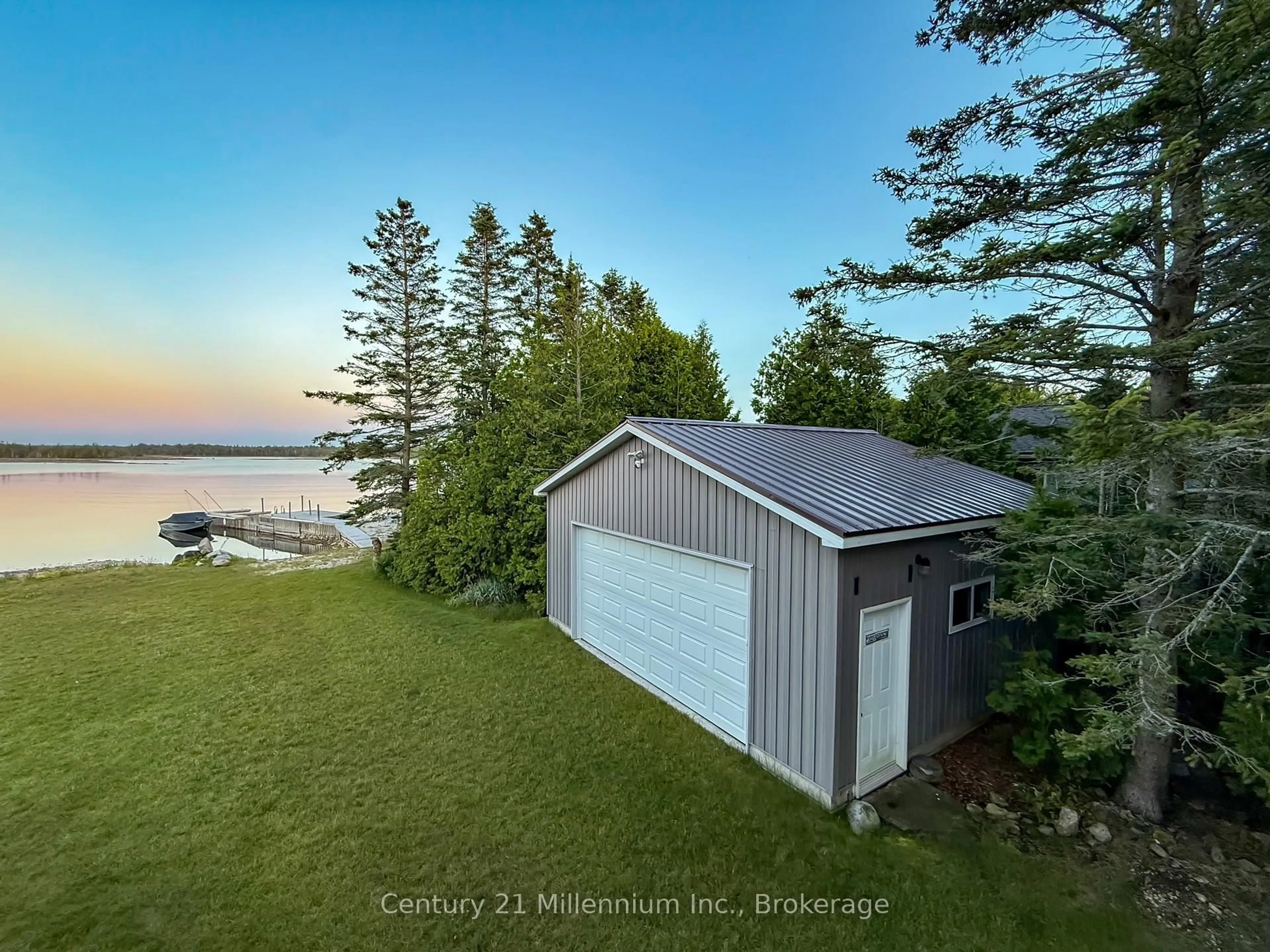 A pic from outside/outdoor area/front of a property/back of a property/a pic from drone, water/lake/river/ocean view for 119 Pine Tree Harbour Rd, Northern Bruce Peninsula Ontario N0H 1Z0