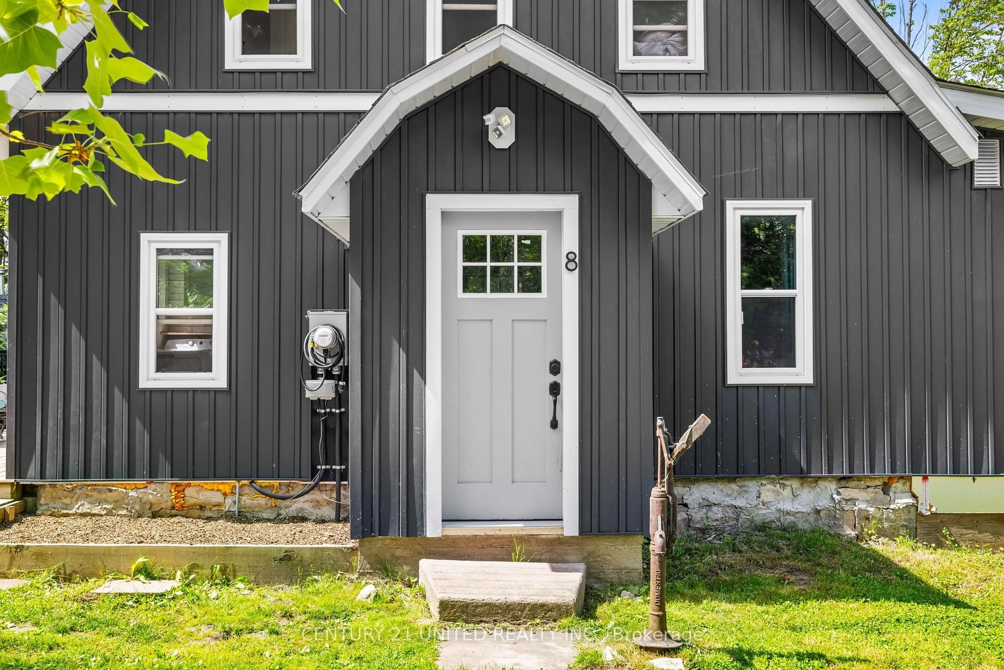 Home with vinyl exterior material, street for 8 Library Rd, North Kawartha Ontario K0L 3E0