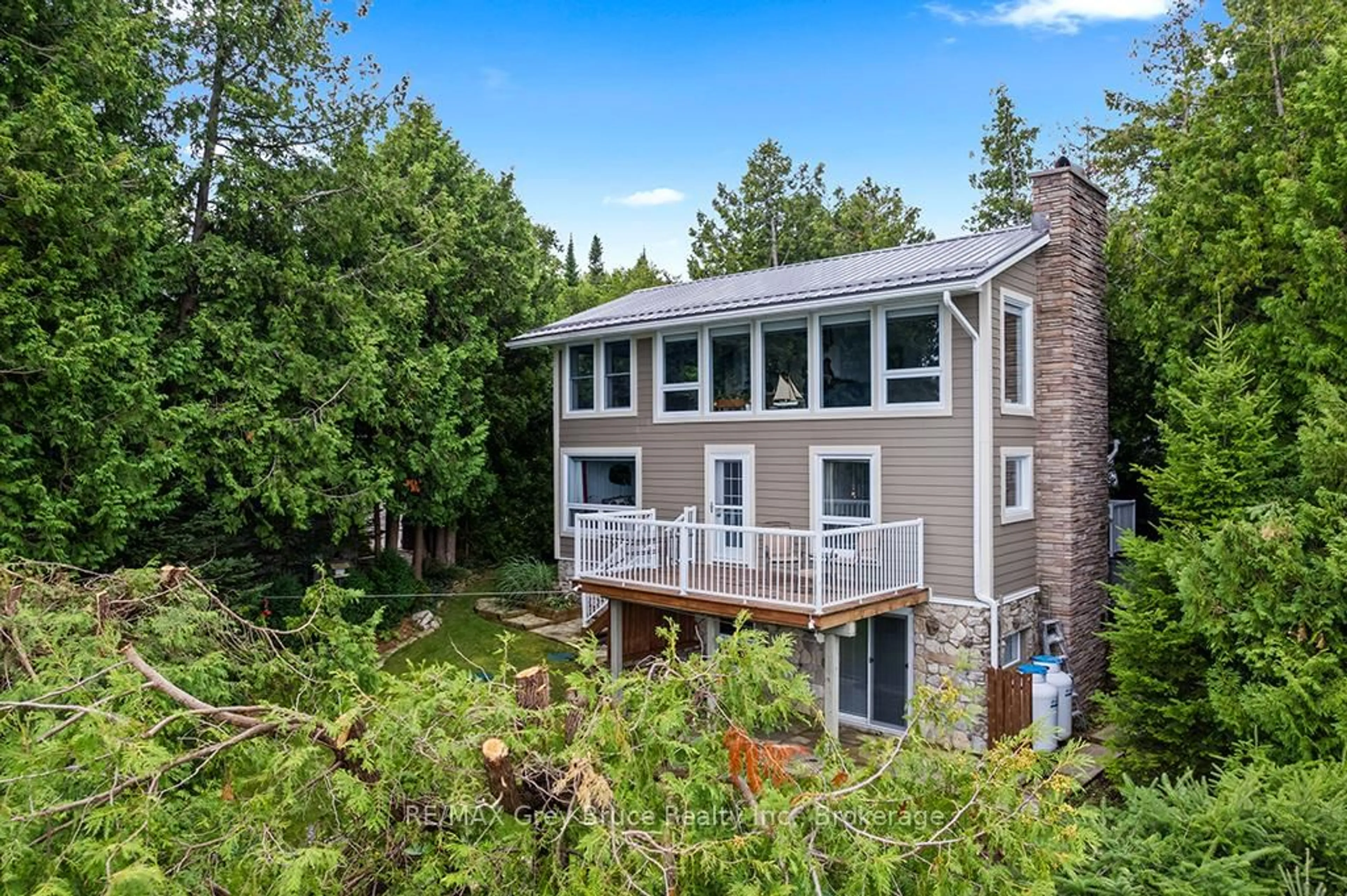 A pic from outside/outdoor area/front of a property/back of a property/a pic from drone, water/lake/river/ocean view for 6 Chetwynd Lane, Northern Bruce Peninsula Ontario N0H 1W0