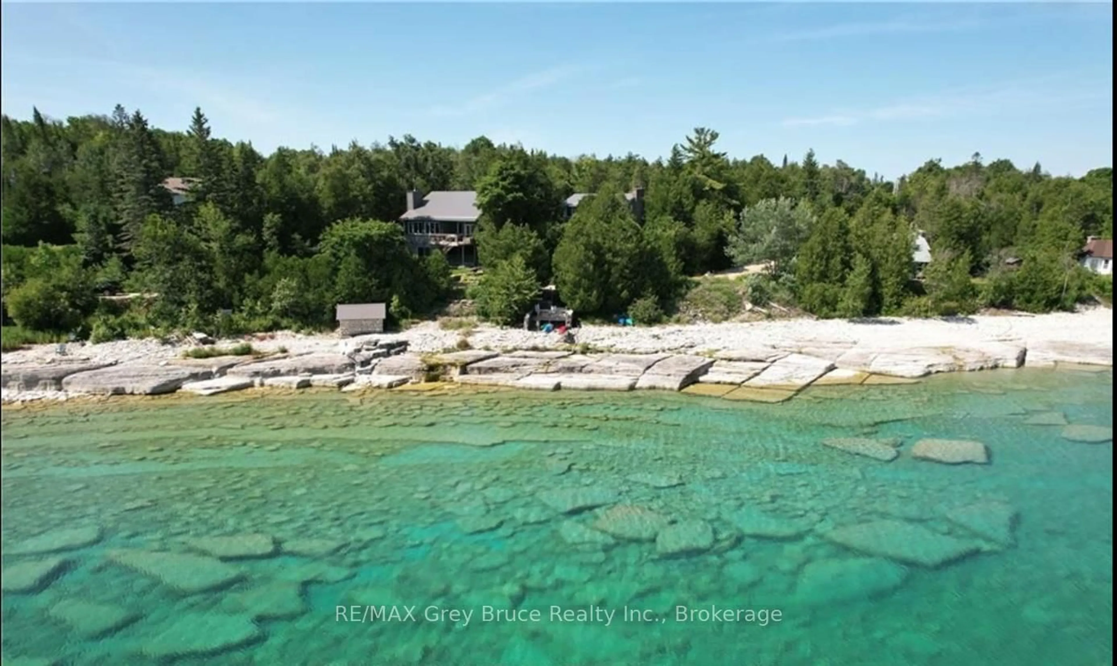 A pic from outside/outdoor area/front of a property/back of a property/a pic from drone, water/lake/river/ocean view for 6 Chetwynd Lane, Northern Bruce Peninsula Ontario N0H 1W0