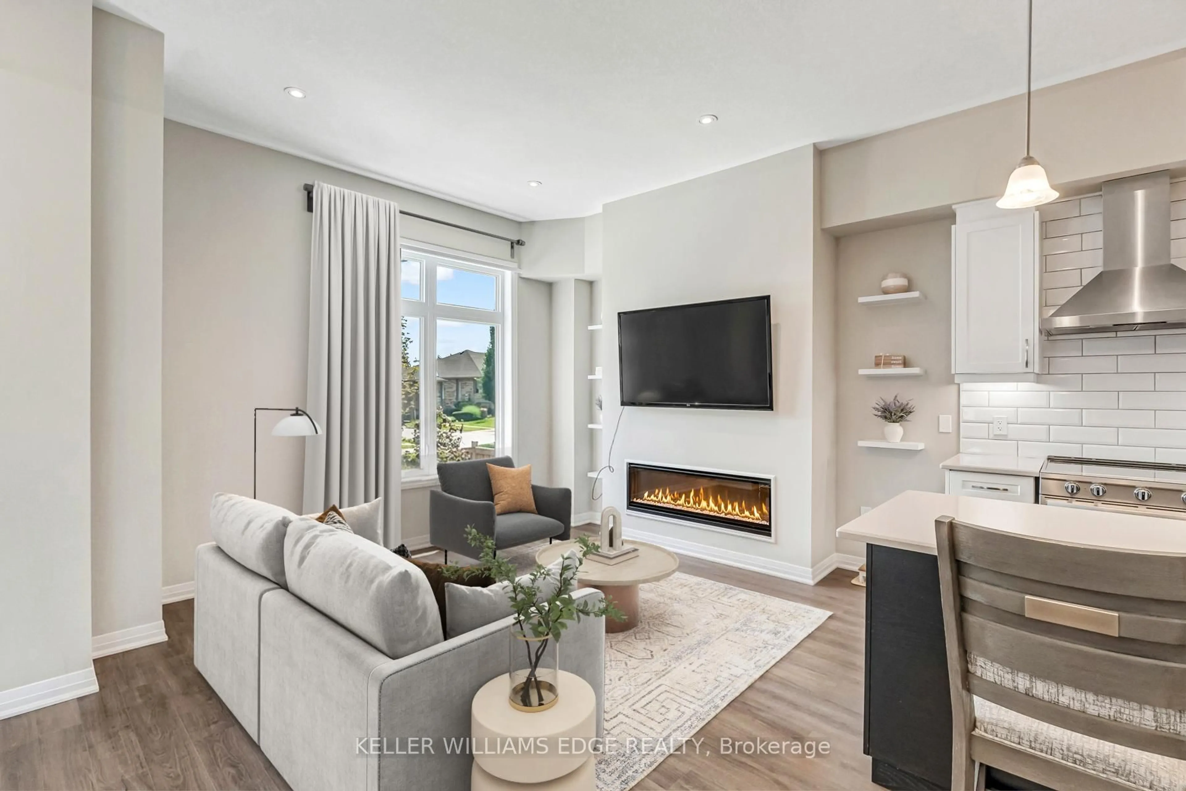 Living room with furniture, unknown for 25 Isherwood Ave #J138, Cambridge Ontario N1R 1B6