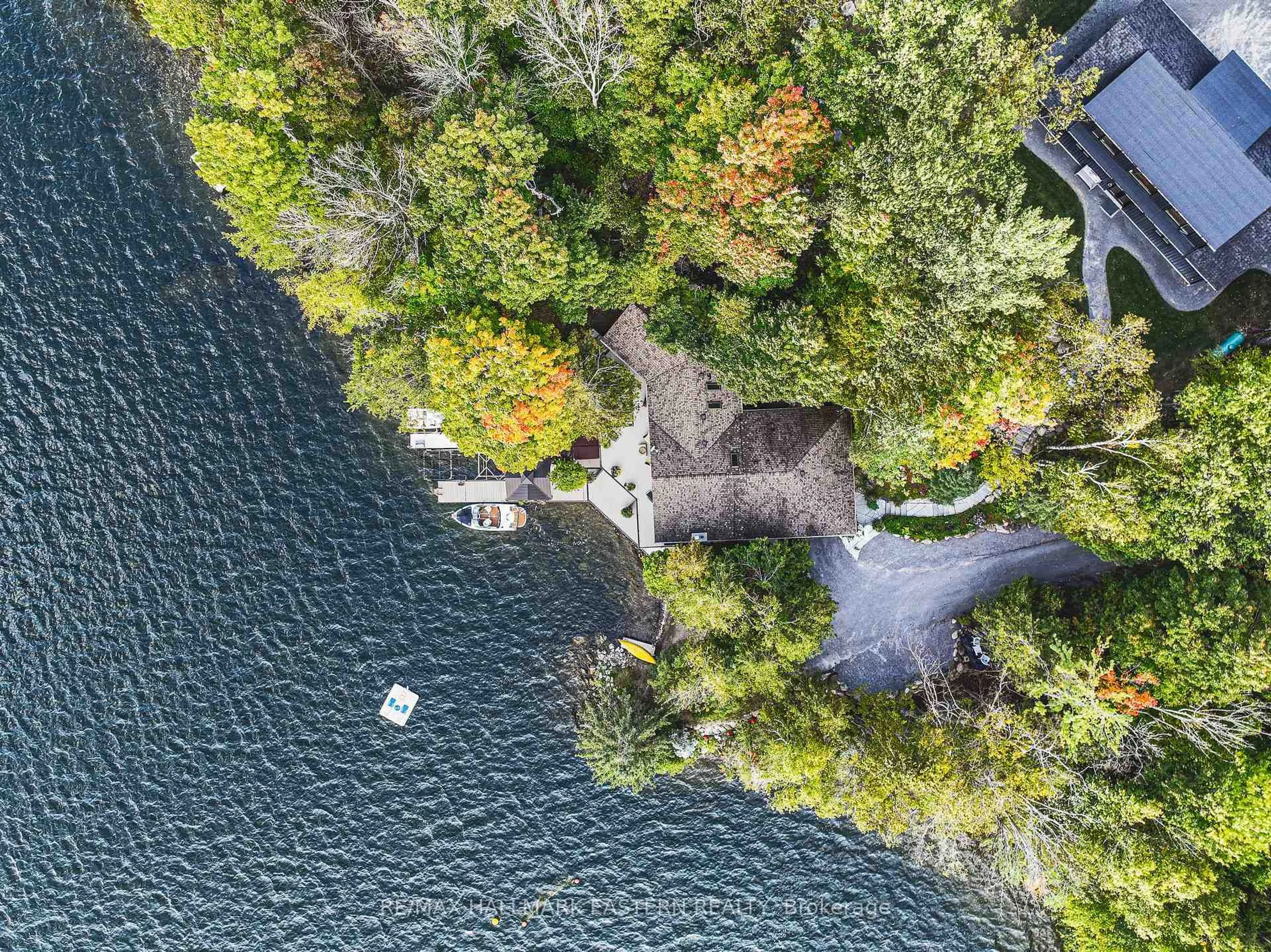 A pic from outside/outdoor area/front of a property/back of a property/a pic from drone, water/lake/river/ocean view for 1052 Tedford Lane, Douro-Dummer Ontario K0L 2H0