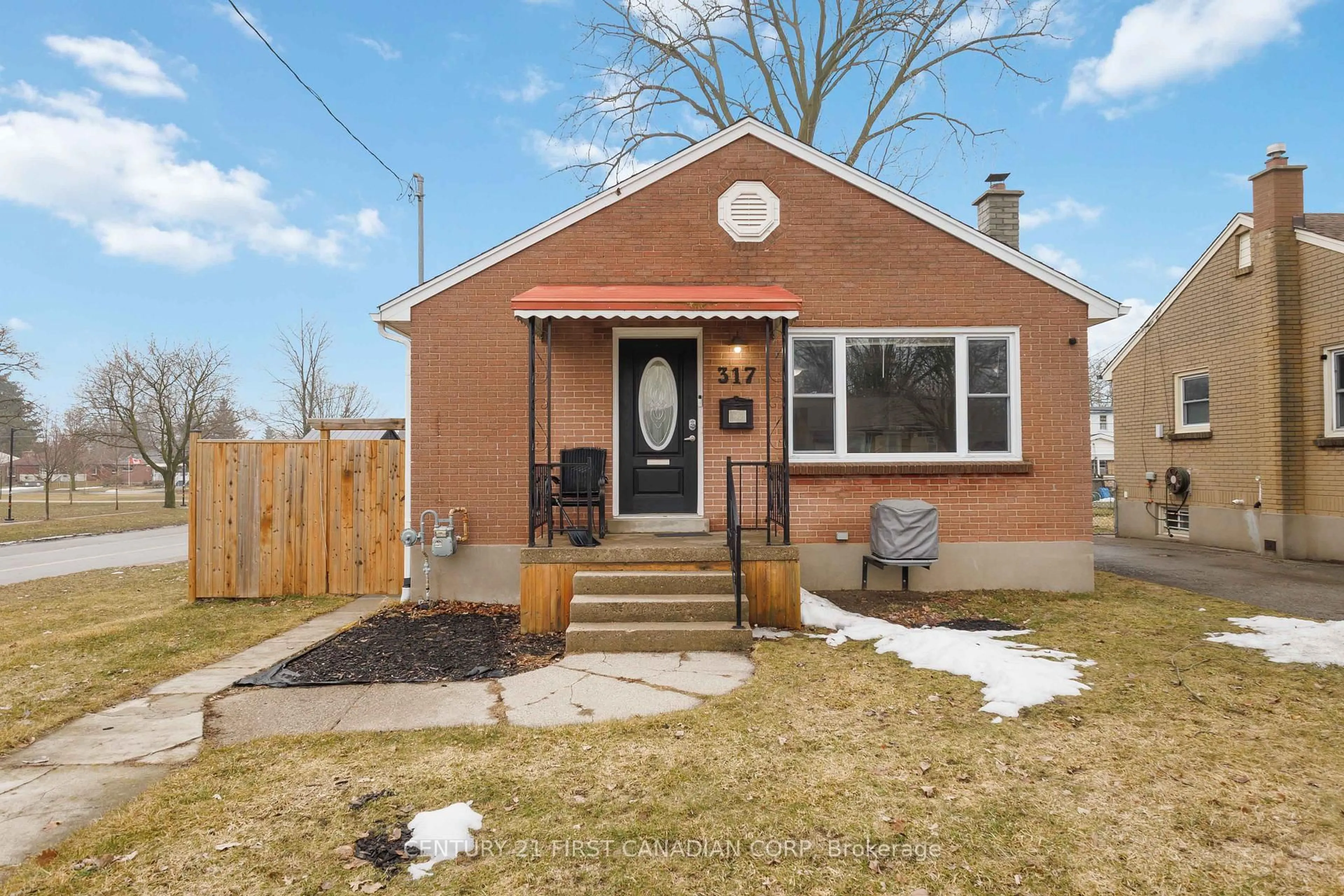 Home with brick exterior material, street for 317 Manitoba St, London East Ontario N5W 4W2