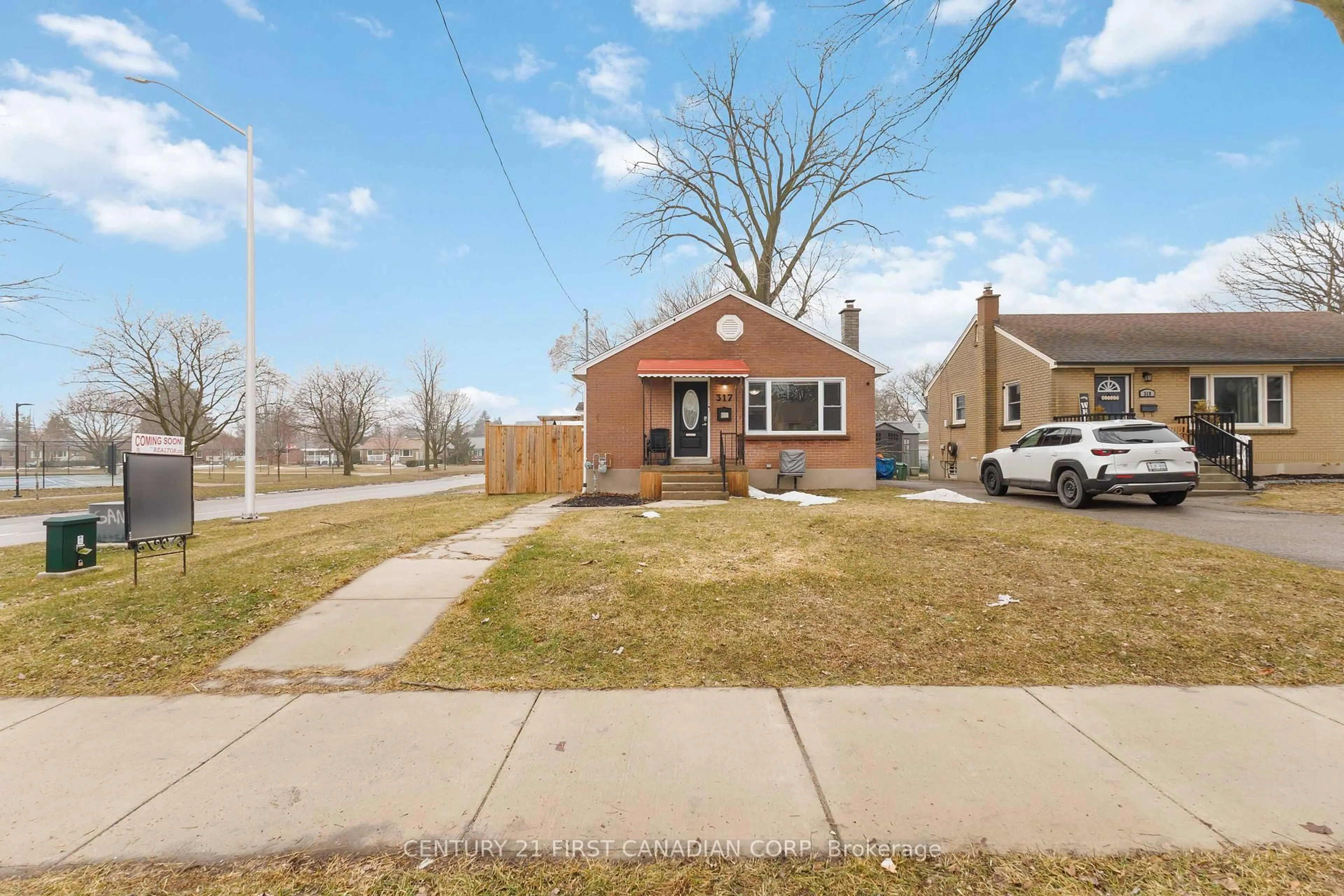 Home with brick exterior material, street for 317 Manitoba St, London East Ontario N5W 4W2