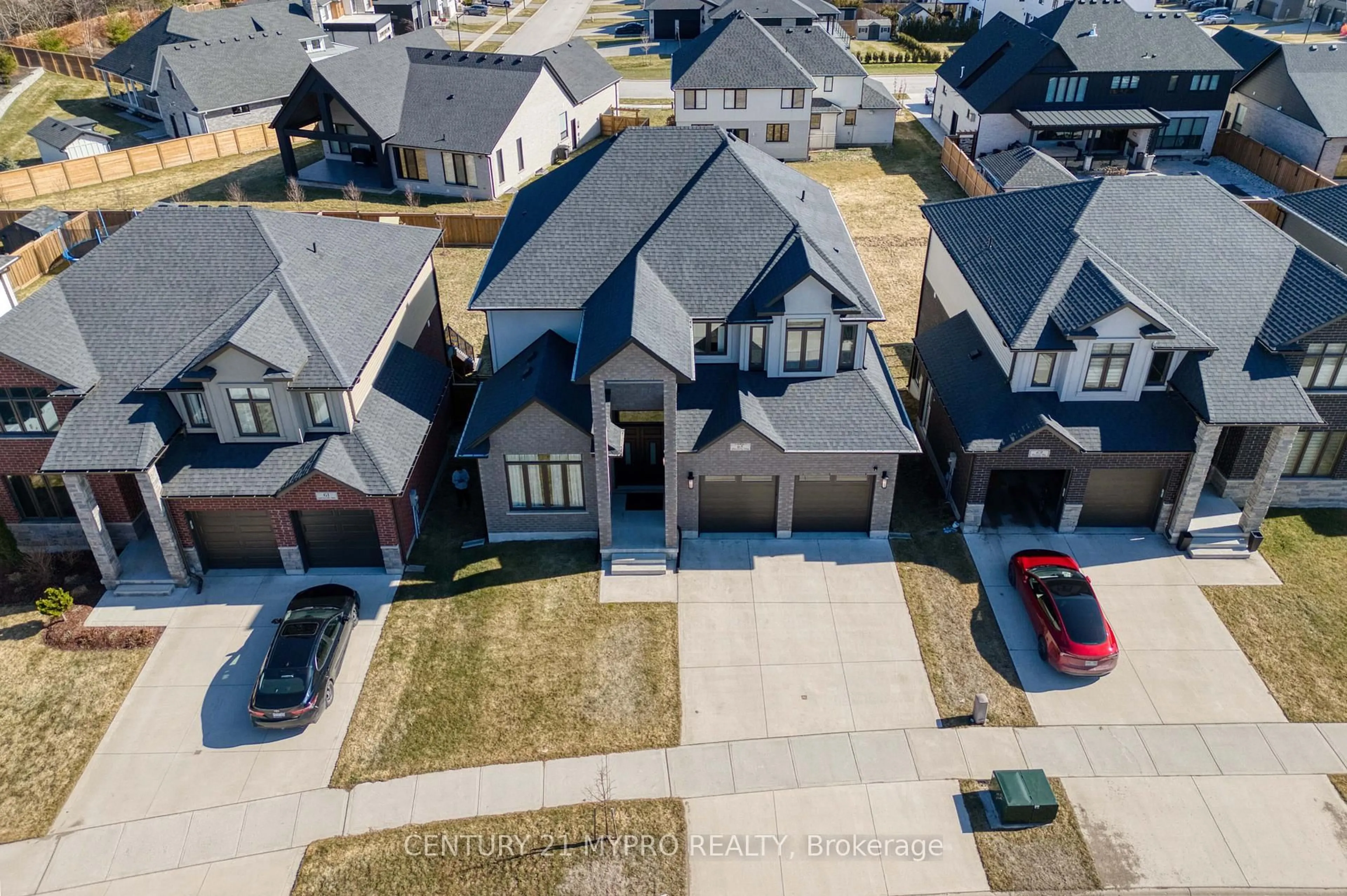 A pic from outside/outdoor area/front of a property/back of a property/a pic from drone, street for 65 Daventry Way, Middlesex Centre Ontario N0L 1R0