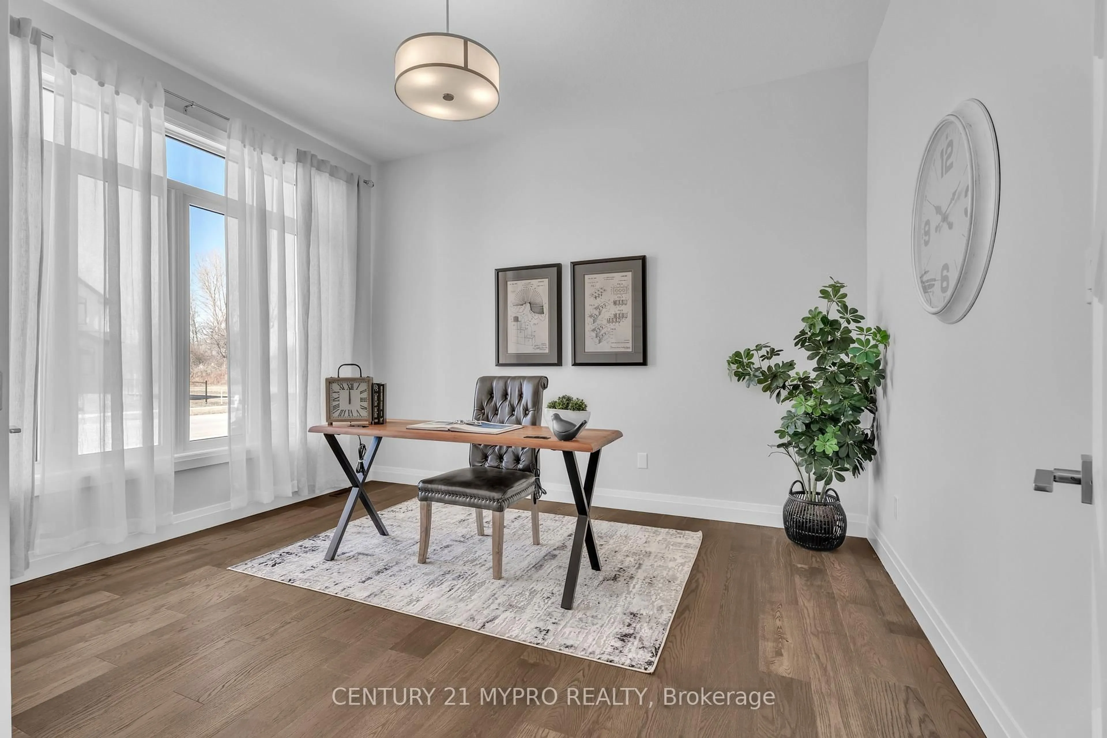 Dining room, wood/laminate floor for 65 Daventry Way, Middlesex Centre Ontario N0L 1R0