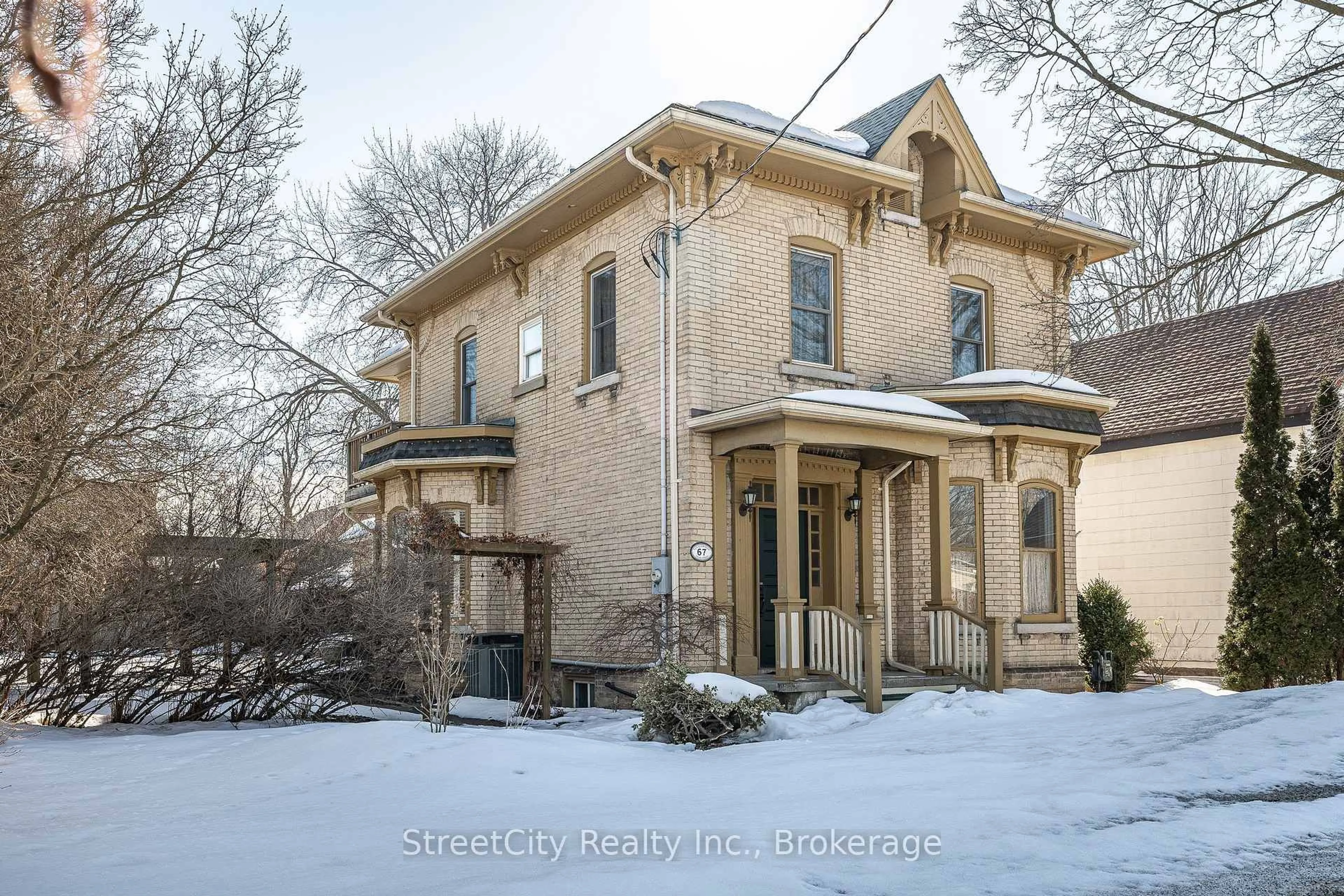 Home with brick exterior material, street for 67 Douro St, Stratford Ontario N5A 3R2