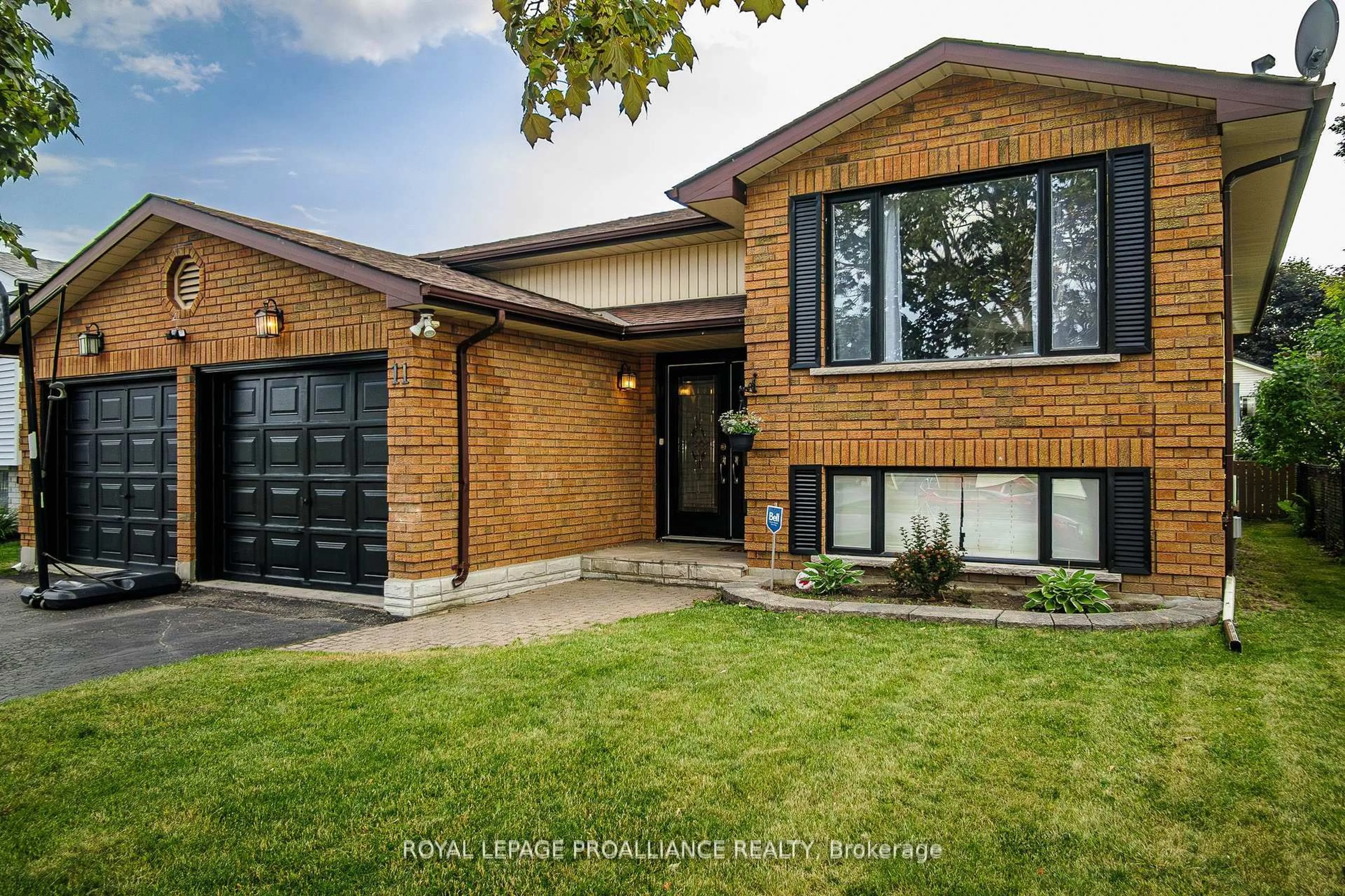 Home with brick exterior material, street for 11 Springbrook Cres, Belleville Ontario K8P 5B7