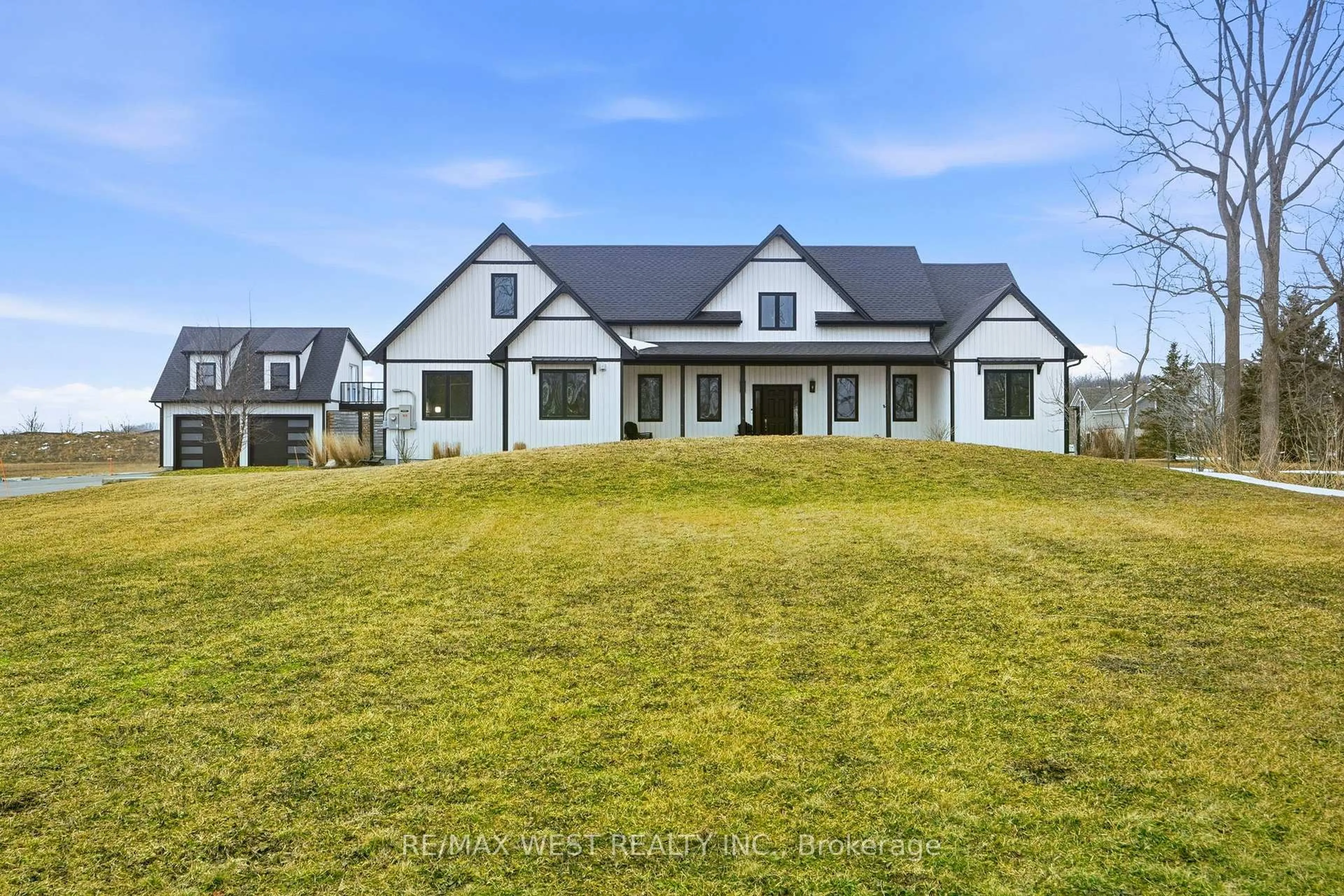 A pic from outside/outdoor area/front of a property/back of a property/a pic from drone, mountain view for 480 Pleasant Beach Rd, Port Colborne Ontario L0S 1R0