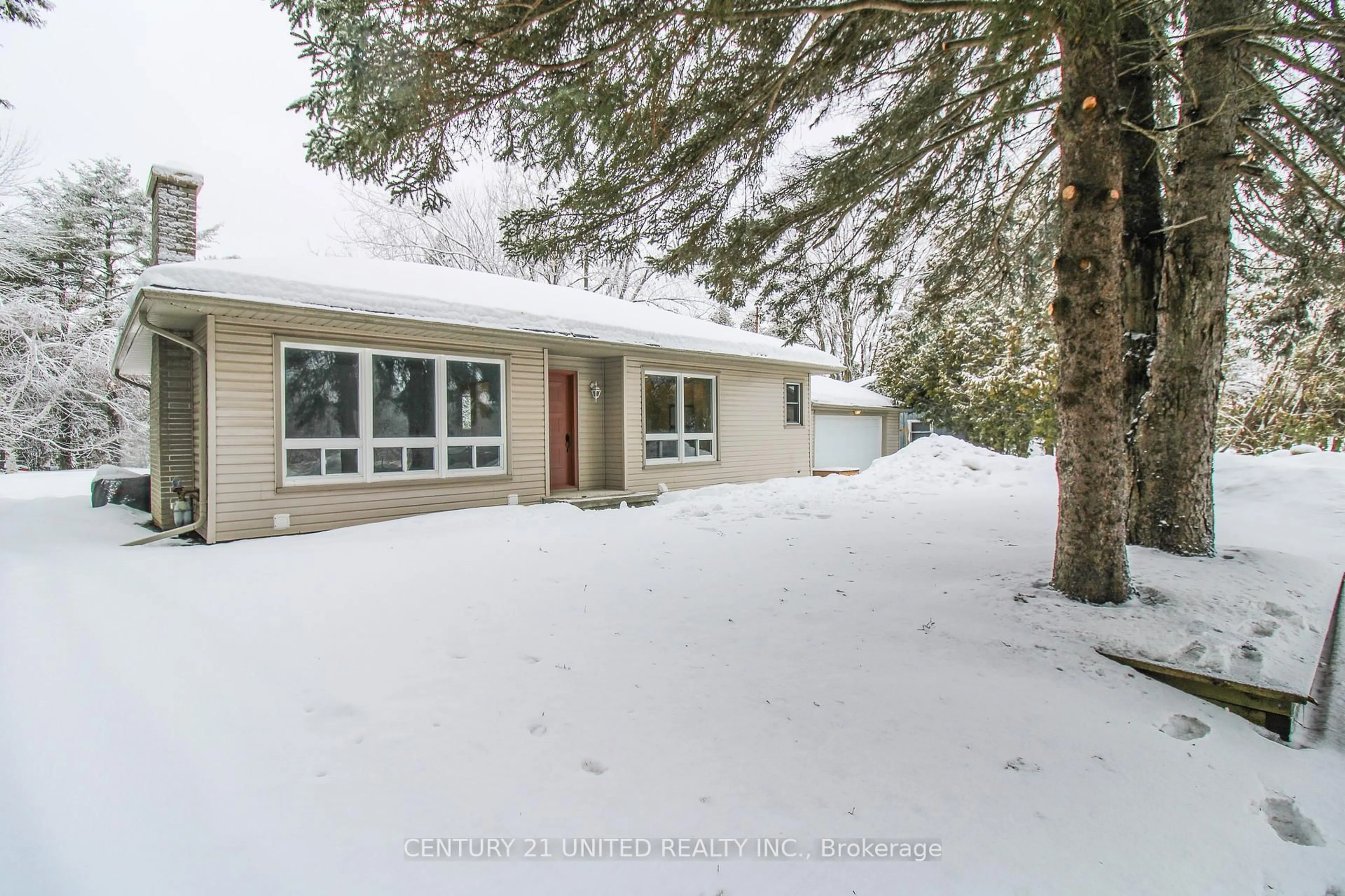 A pic from outside/outdoor area/front of a property/back of a property/a pic from drone, street for 3017 Lakefield Rd, Selwyn Ontario K9J 6X5