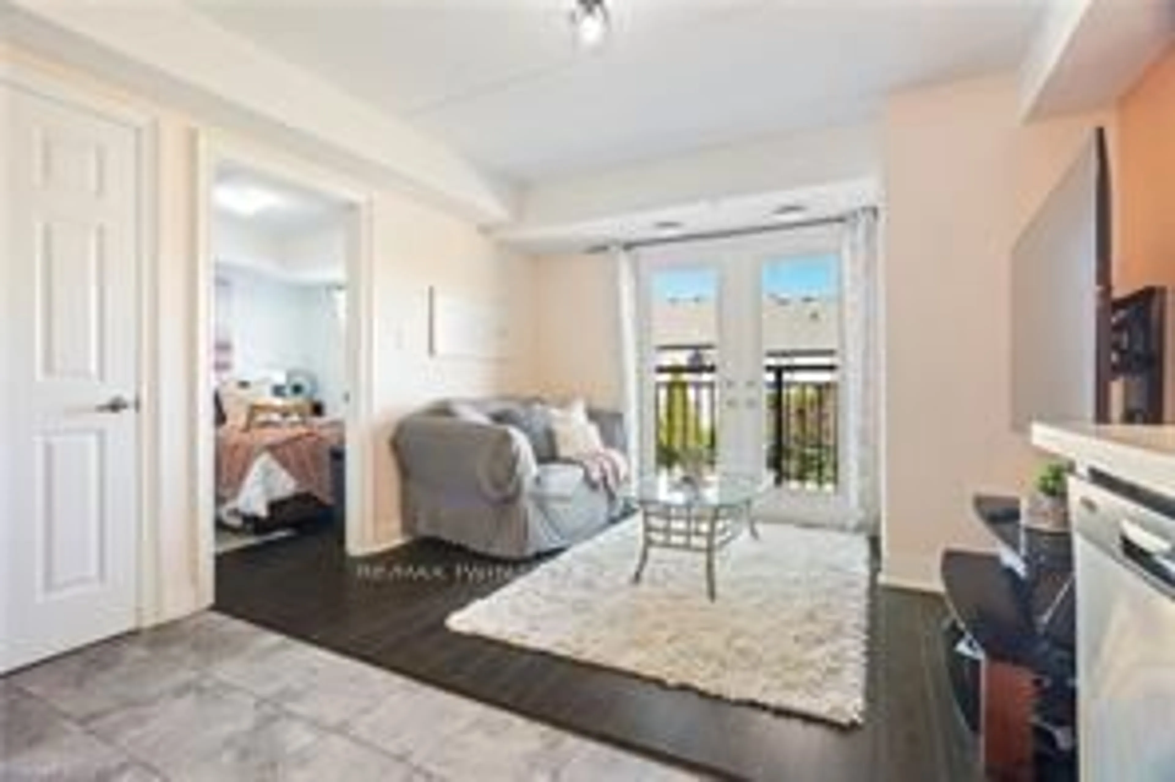 Living room with furniture, unknown for 64 Frederick Dr #204, Guelph Ontario N1L 0P3