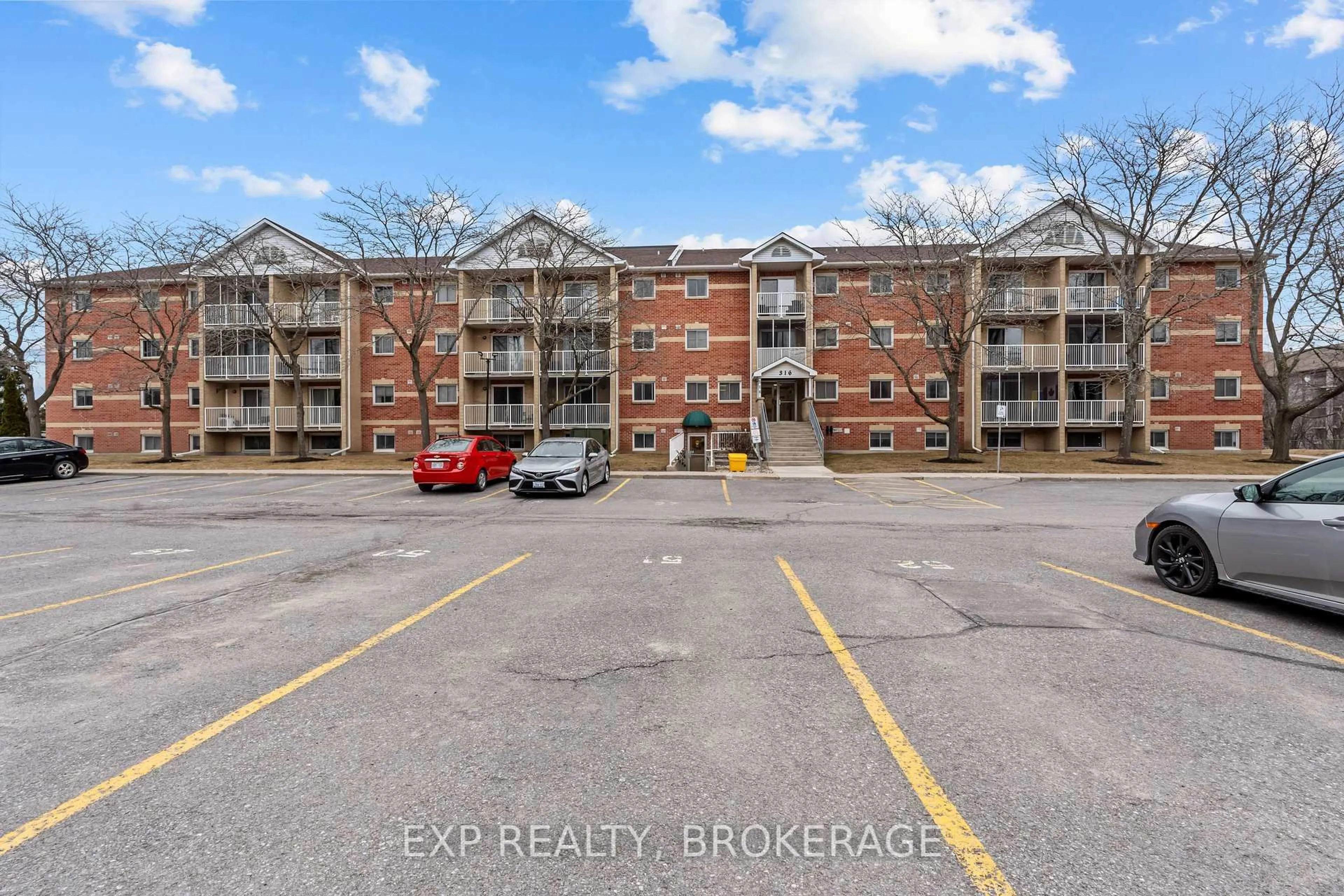 A pic from outside/outdoor area/front of a property/back of a property/a pic from drone, street for 316 KINGSDALE Ave #408, Kingston Ontario K7M 8S2