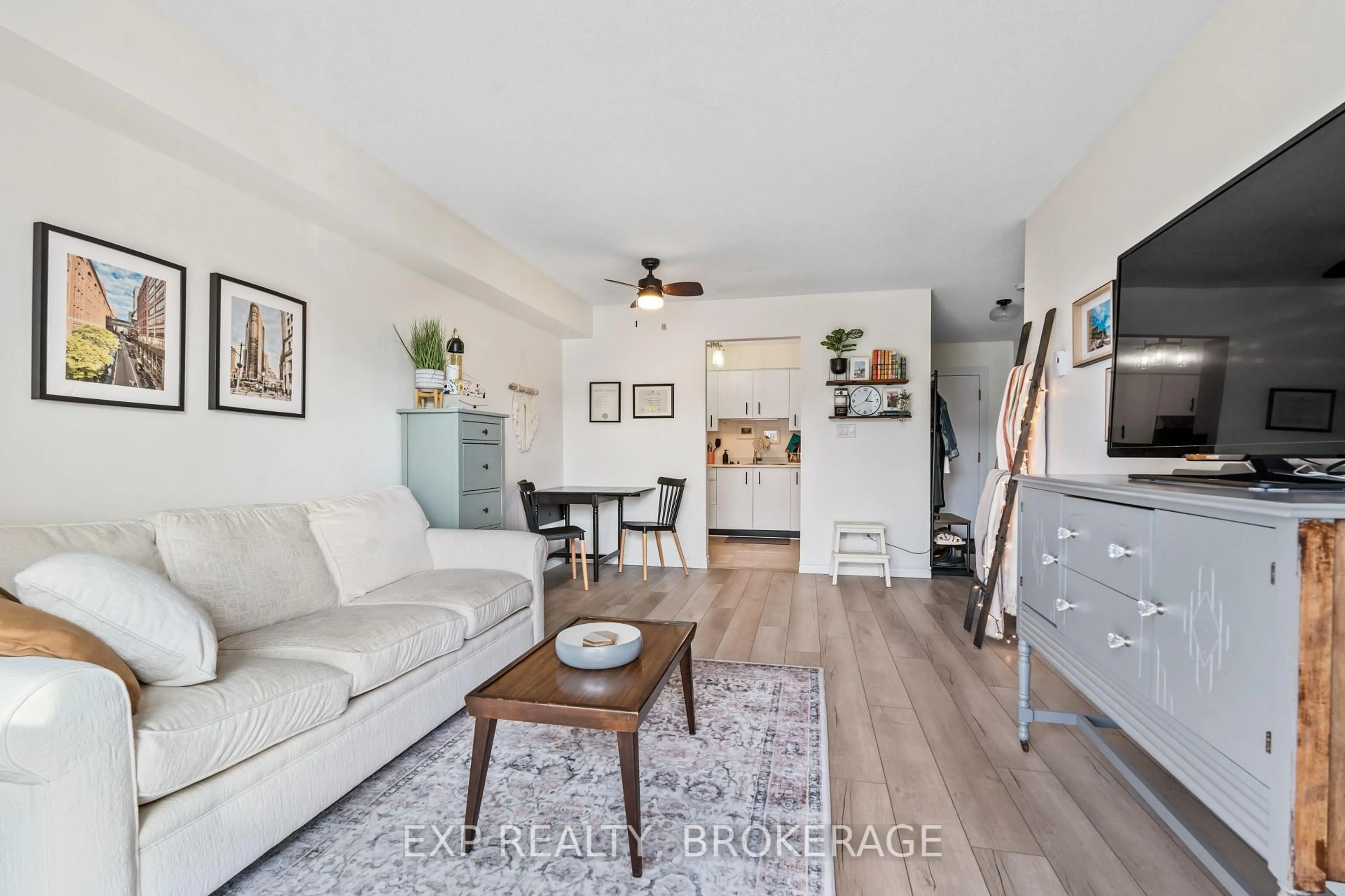 Living room with furniture, wood/laminate floor for 316 KINGSDALE Ave #408, Kingston Ontario K7M 8S2