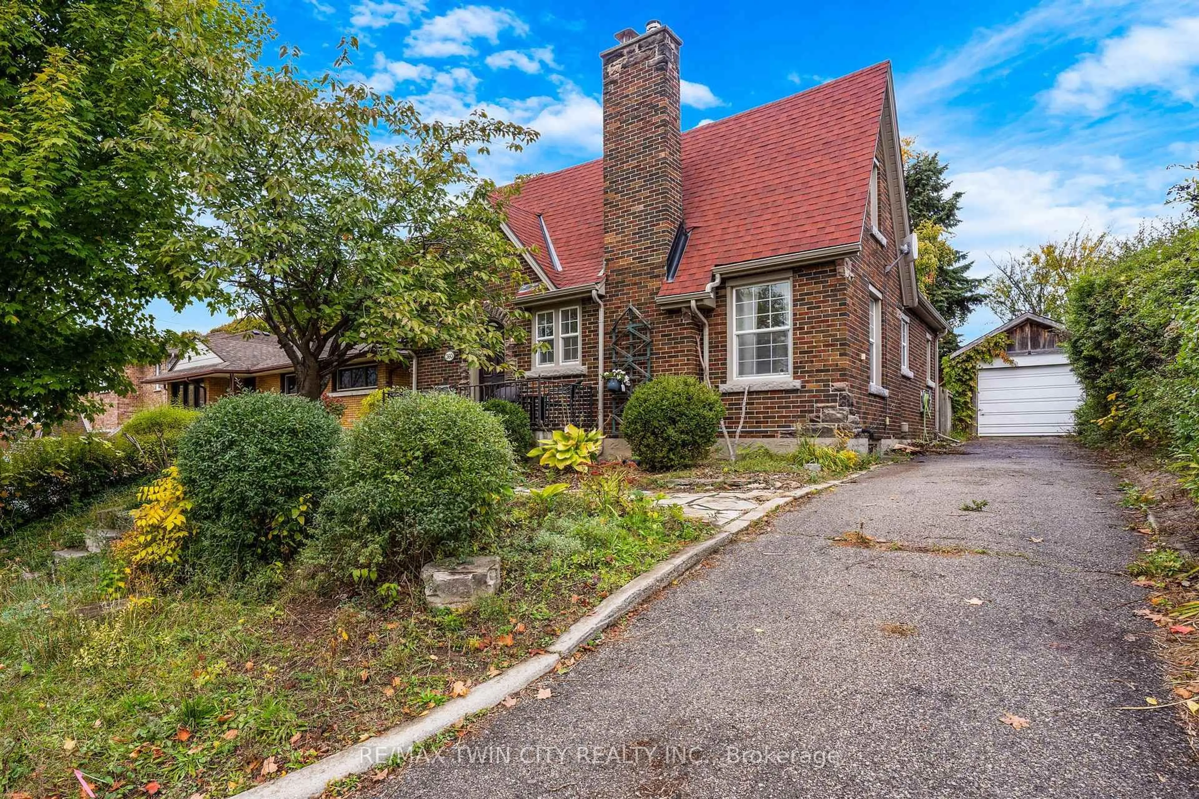 Home with brick exterior material, street for 360 Luella St, Kitchener Ontario N2H 2J4