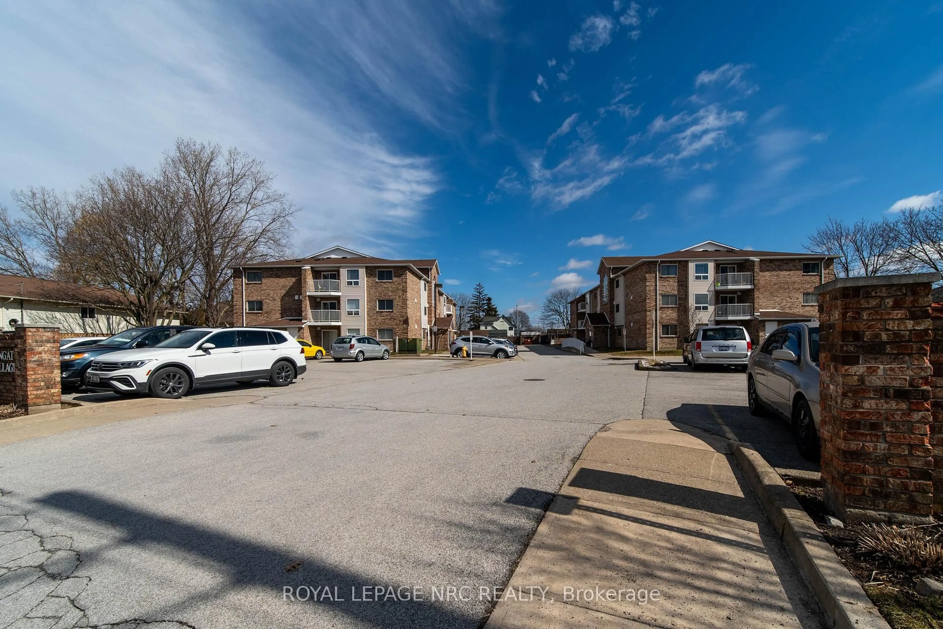 A pic from outside/outdoor area/front of a property/back of a property/a pic from drone, street for 1061 Vansickle Rd #202B, St. Catharines Ontario L2S 2X4
